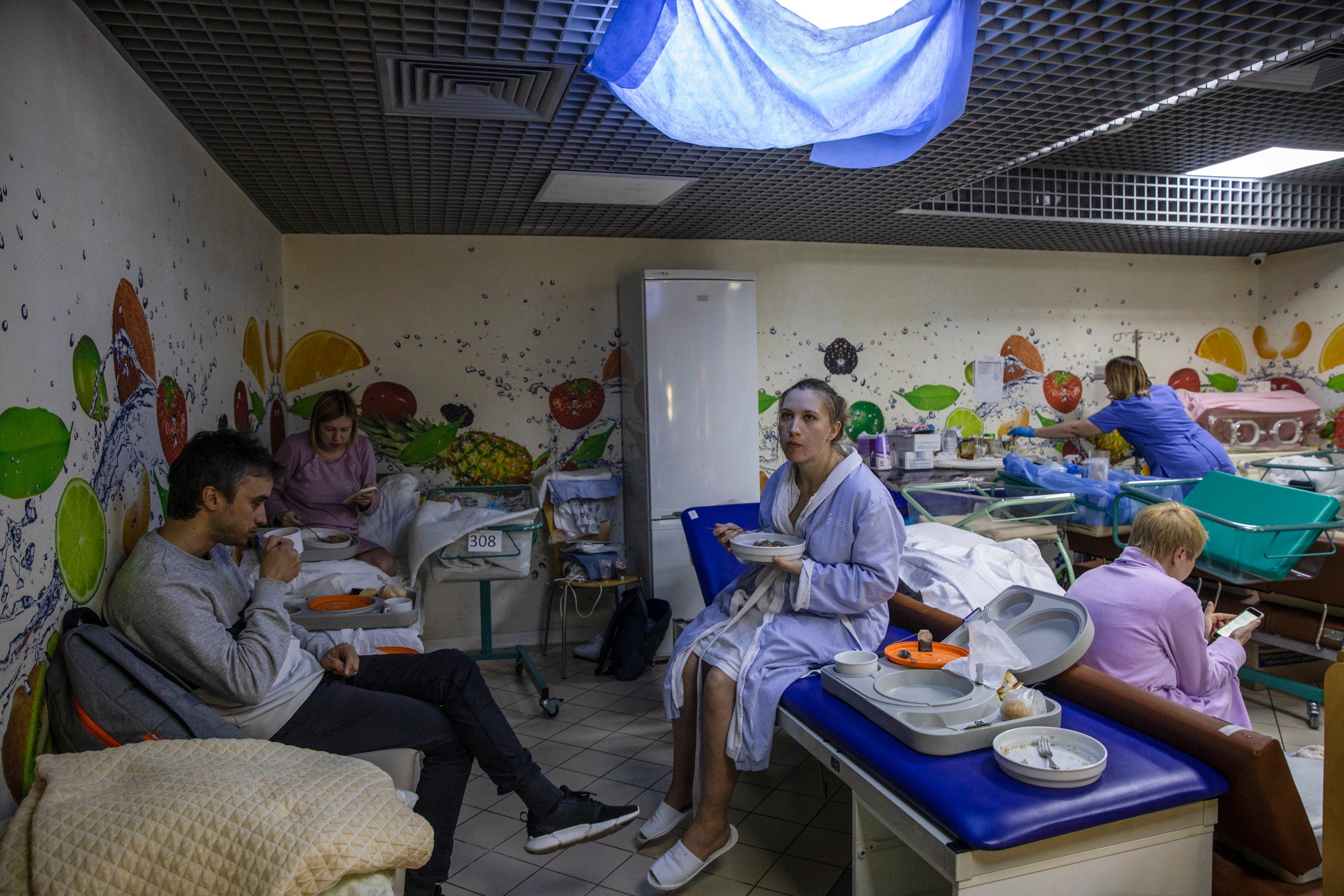 Max Chiciuc and his wife, Iuliia Kuznietsova, in the underground maternity ward of the Isida clinic