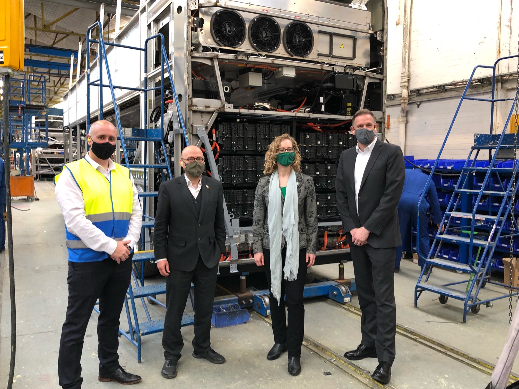 Patrick Harvie, centre left, and Lorna Slater, centre right, visited the Alexander Dennis bus plant (Neil Pooran/PA)