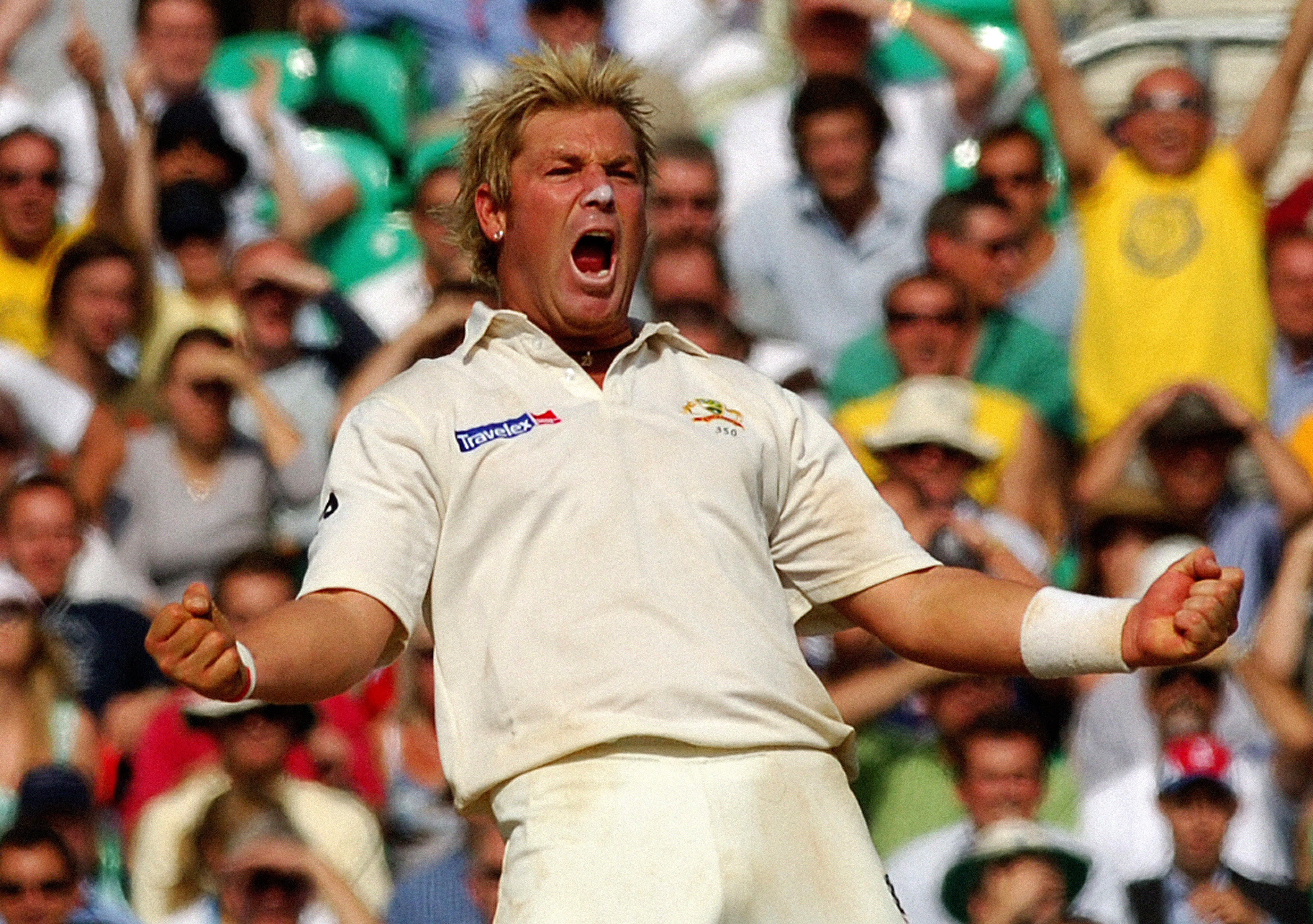 Warne celebrates after he caught and bowled Flintoff for eight runs during the final day of the fifth Test at the Oval in September 2005 (Rui Vieira/PA)