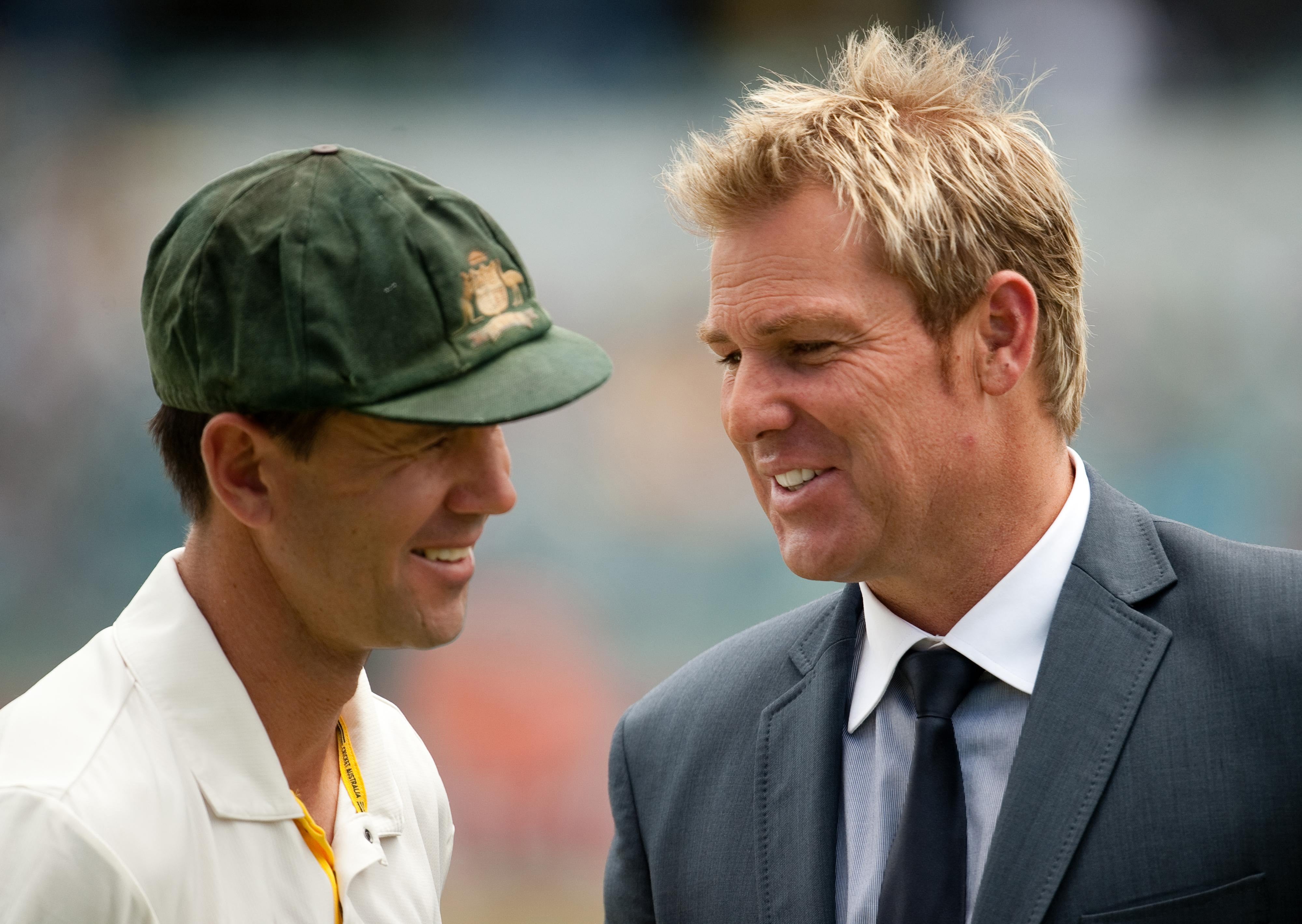 Australian captain Ponting with Warne after the third Ashes Test match at the WACA in December 2010 (Gareth Copley/PA)