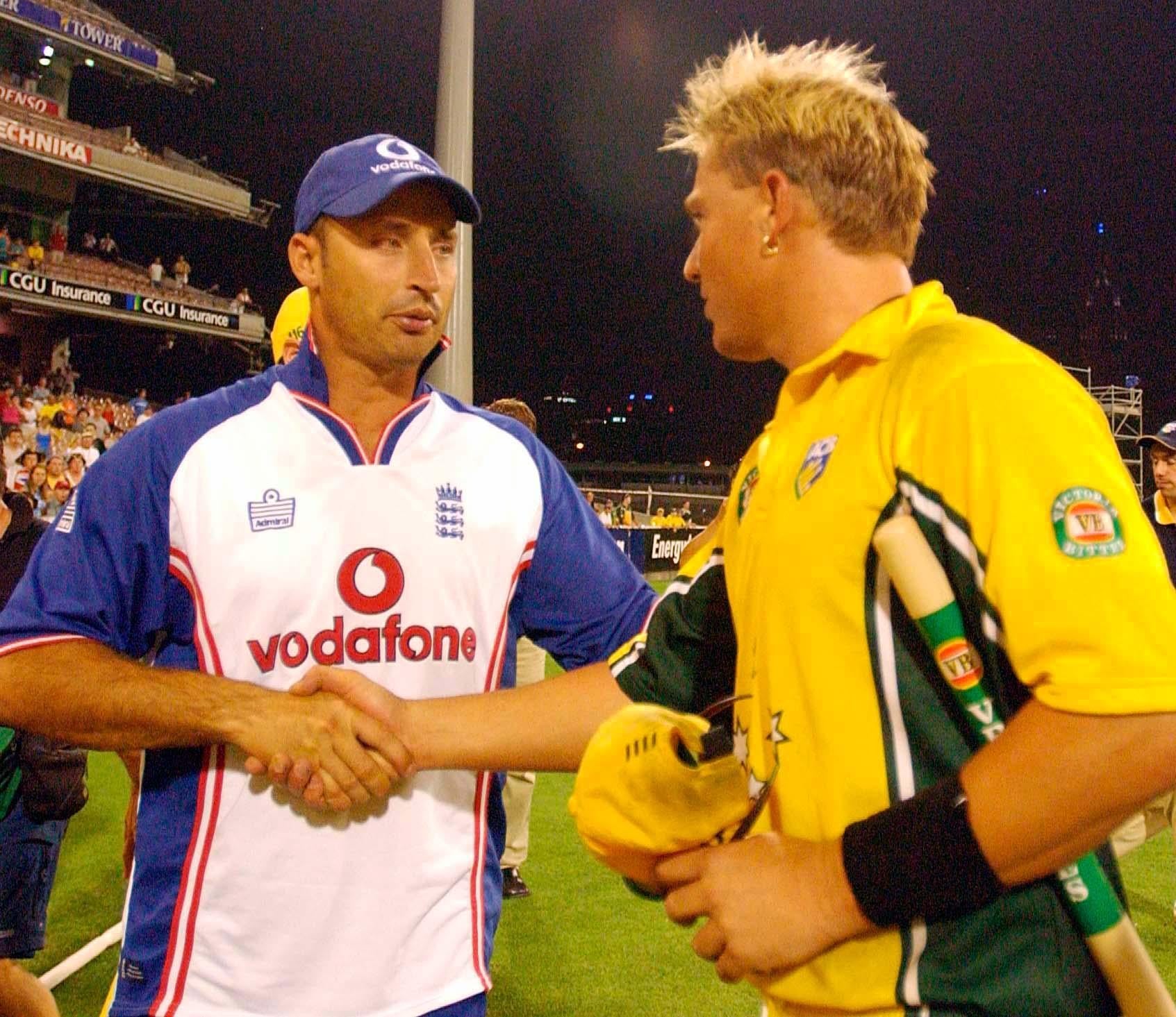 England captain Nasser Hussain shakes hands with Warne after the second VB Series One Day Final at the Melbourne Cricket Ground in January 2003 (Rebecca Naden/PA)