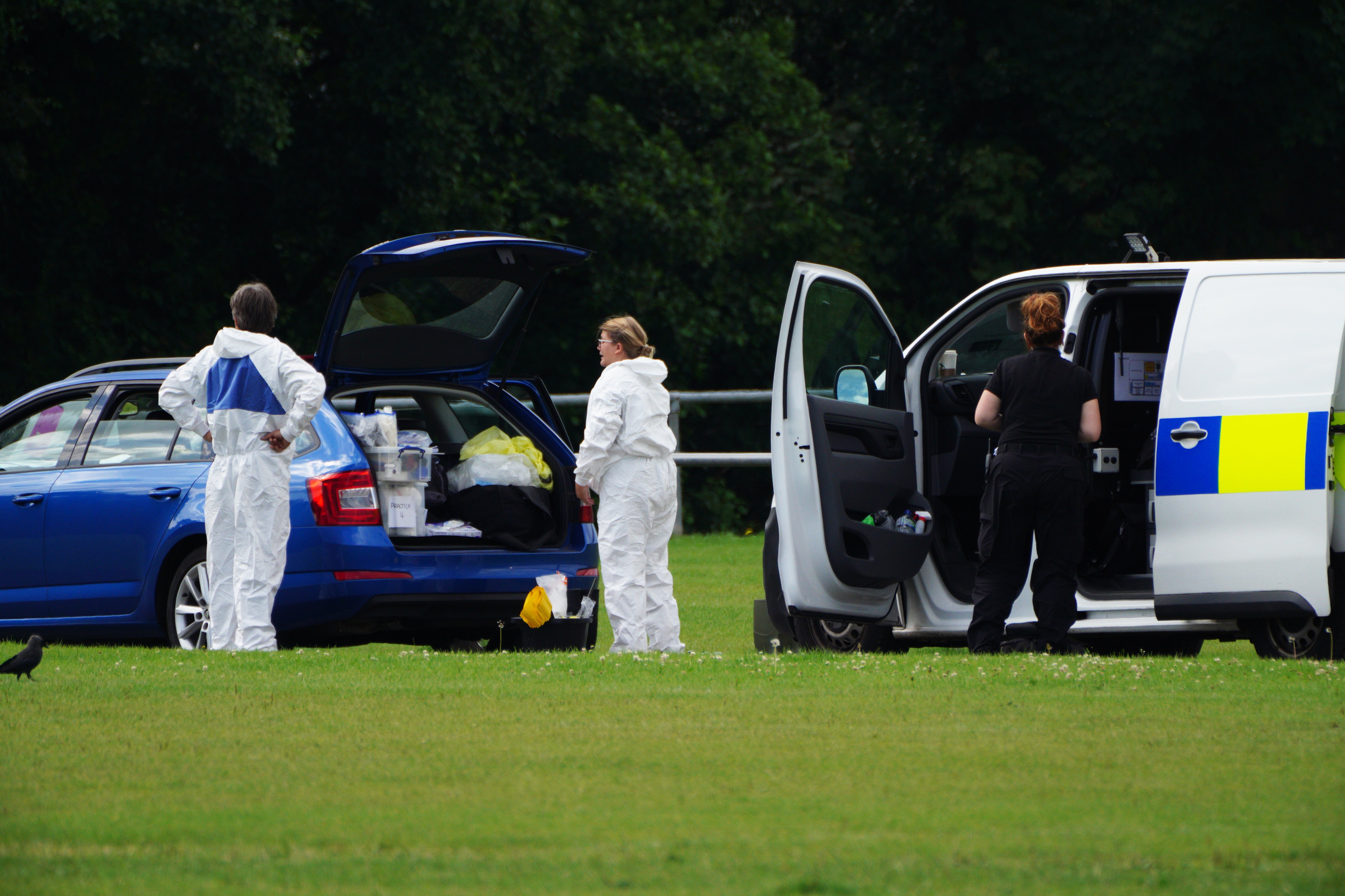 Police forensic officers at the scene in the Sarn area of Bridgend, south Wales, in August.