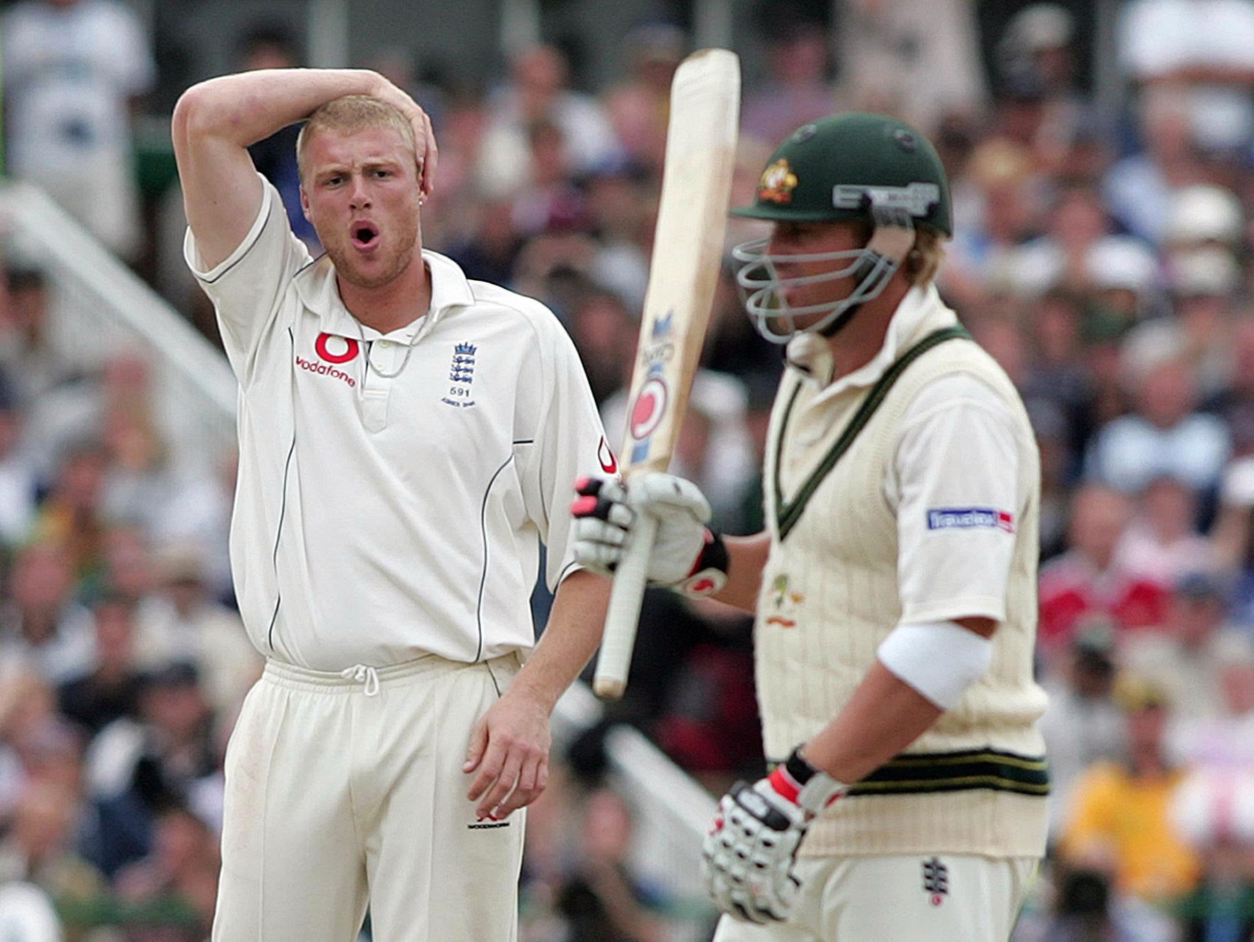 England’s Andrew Flintoff looks dejected after another chance to dismiss Warne goes begging (Martin Rickett/PA)