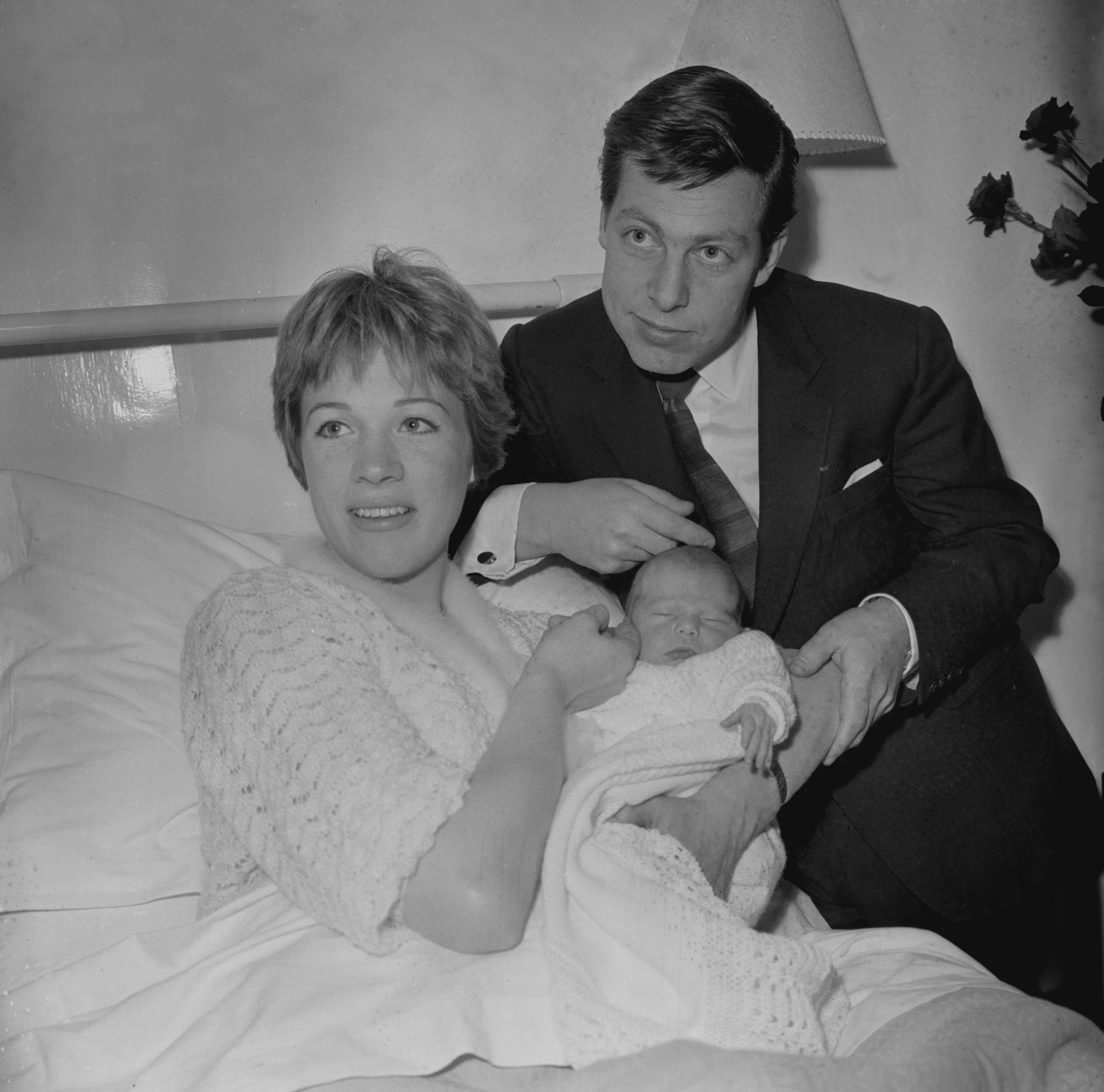 Julie Andrews pictured with Tony Walton and her baby daughter (PA Archive)