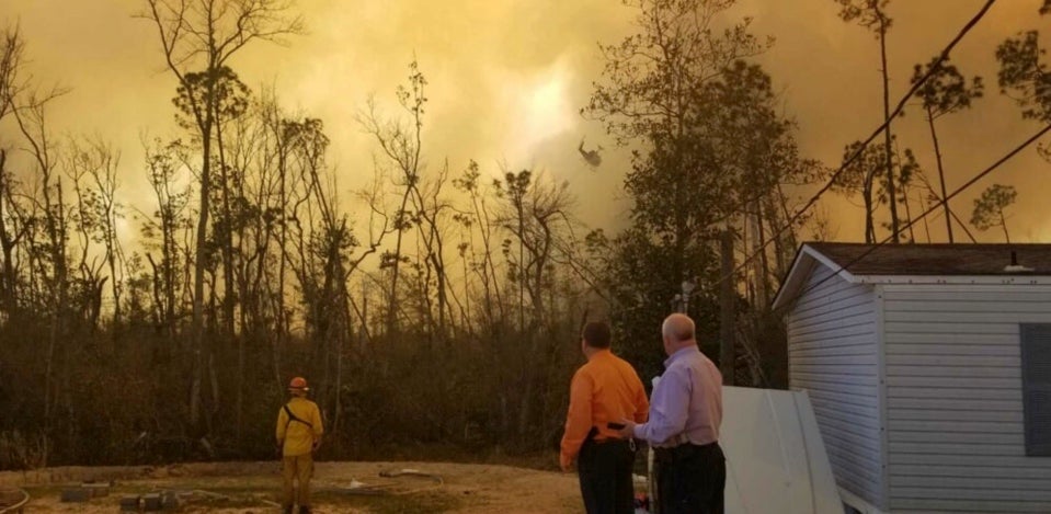 A photo from Bay County Florida Emergency Services shows smoke billowing into the sky