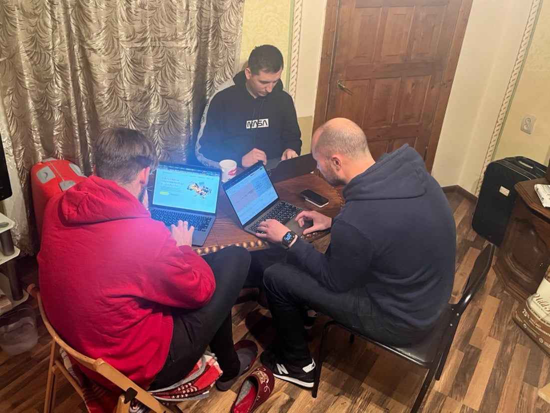 Software developers Andrii Taganskyi and Eugene Gusarov working on their website in Lviv