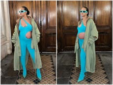 Rihanna highlights baby bump in skintight blue jumpsuit at Paris Fashion Week