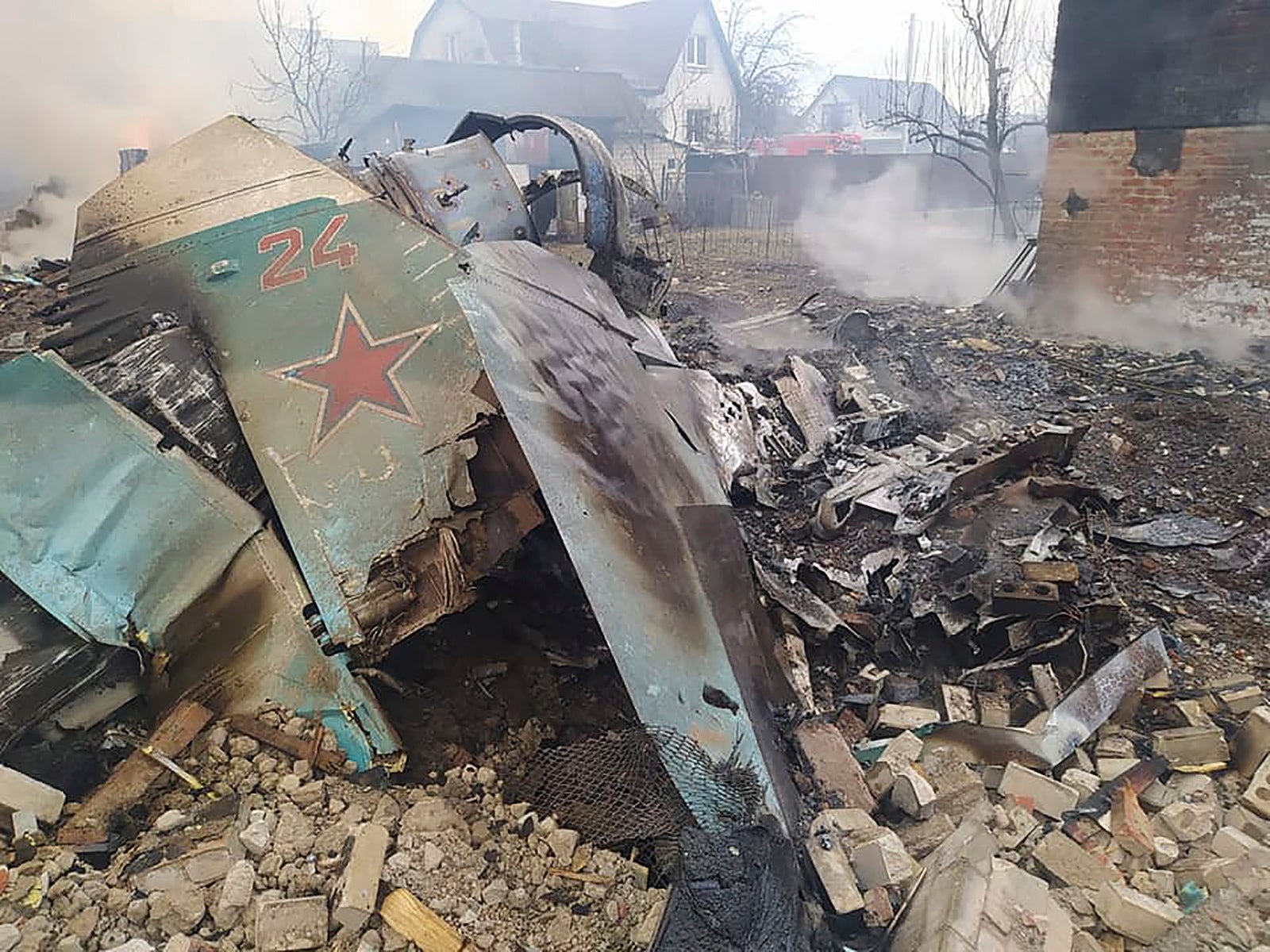 A photo from Ukraine’s State Emergency Service shows the remains of a shot-down Russian aircraft in Chernihiv, 5 March 2022