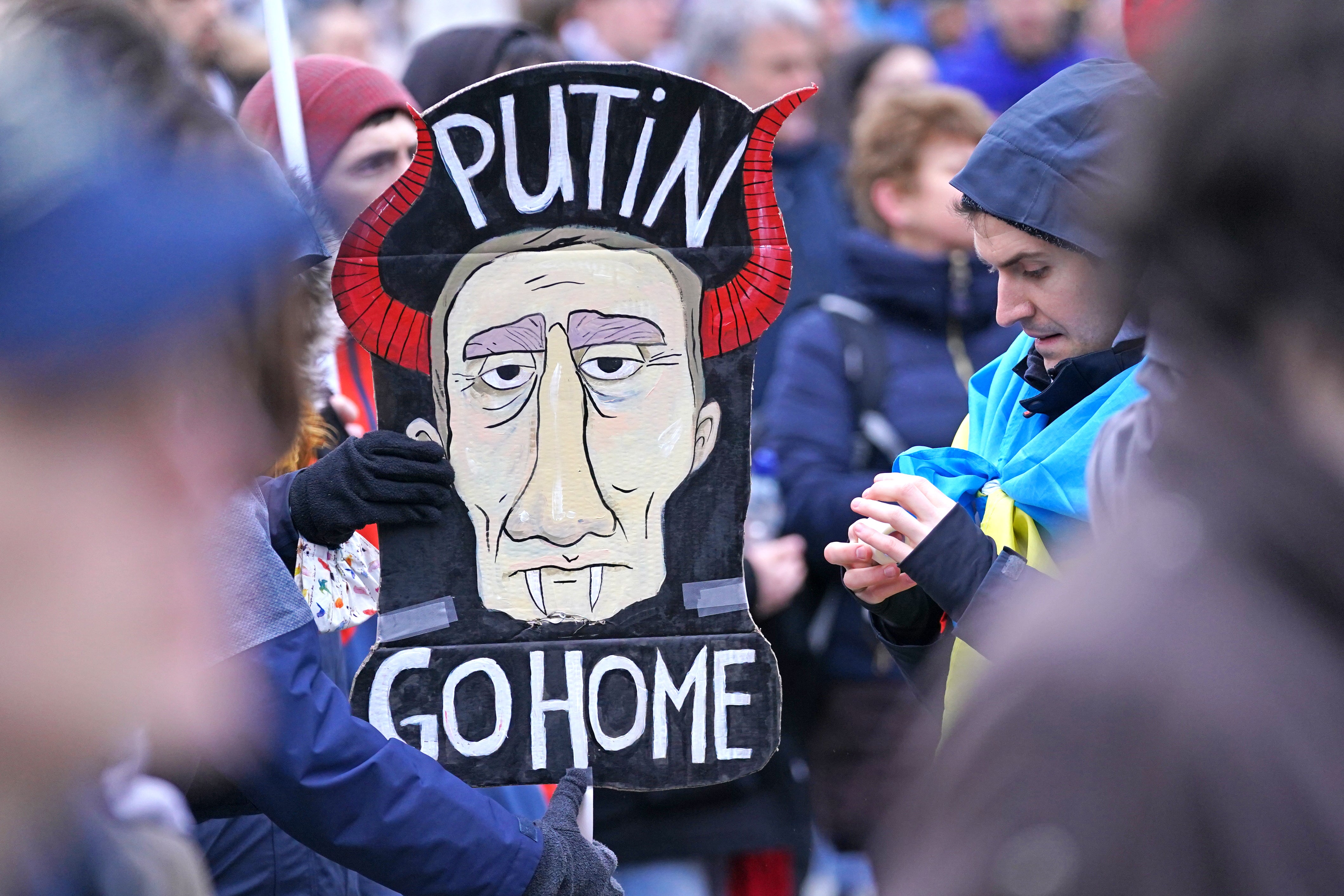 People take part in a demonstration in Trafalgar Square (Ian West/PA)