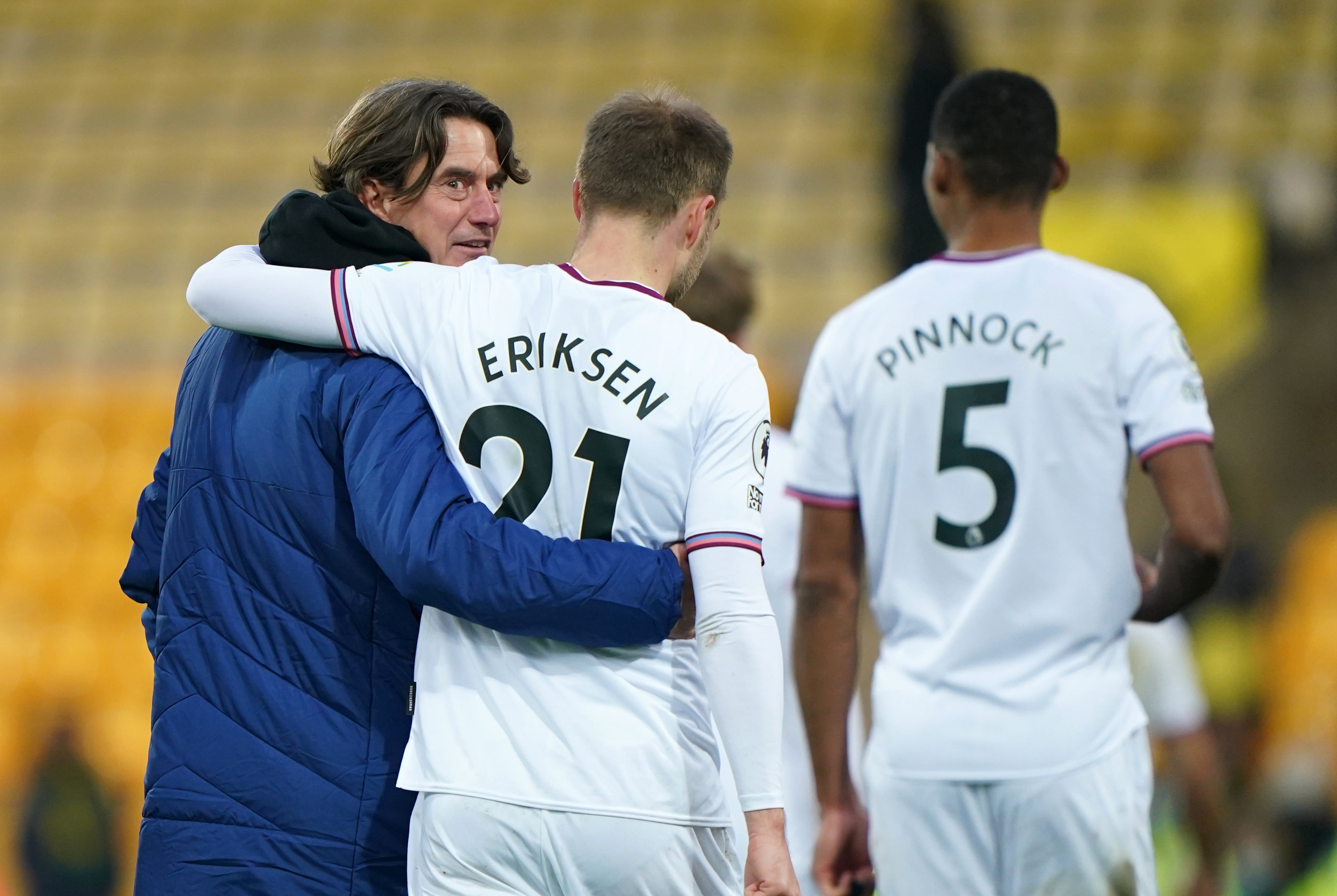 Brentford manager Thomas Frank celebrates victory at Norwich with Christian Eriksen (Joe Giddens/PA)