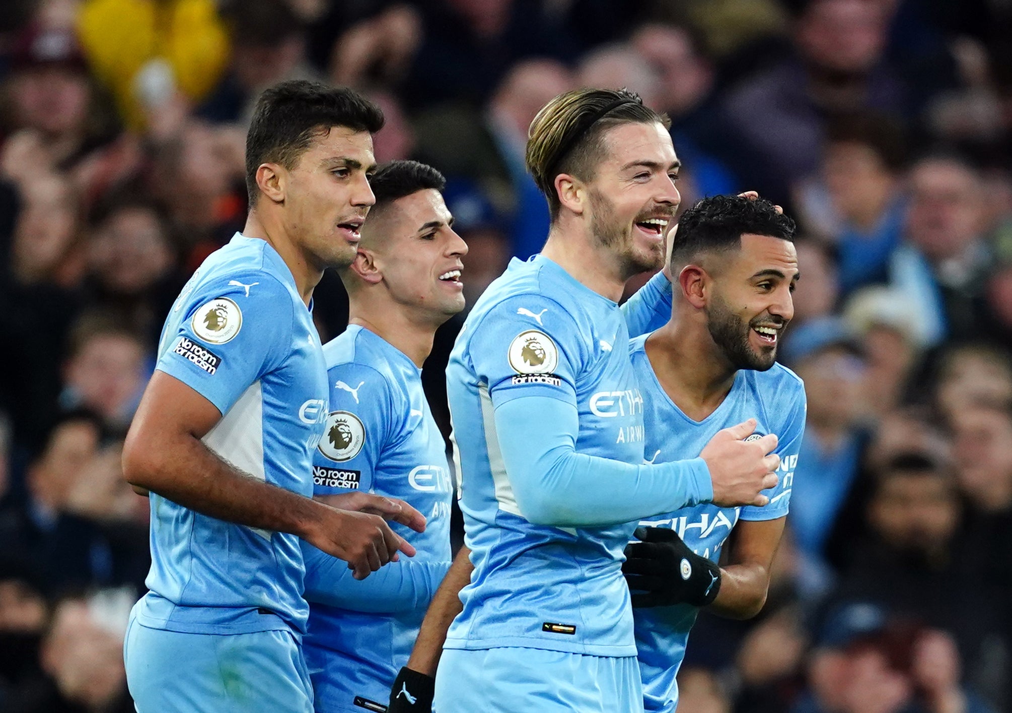 Riyad Mahrez celebrates scoring Man City’s third goal