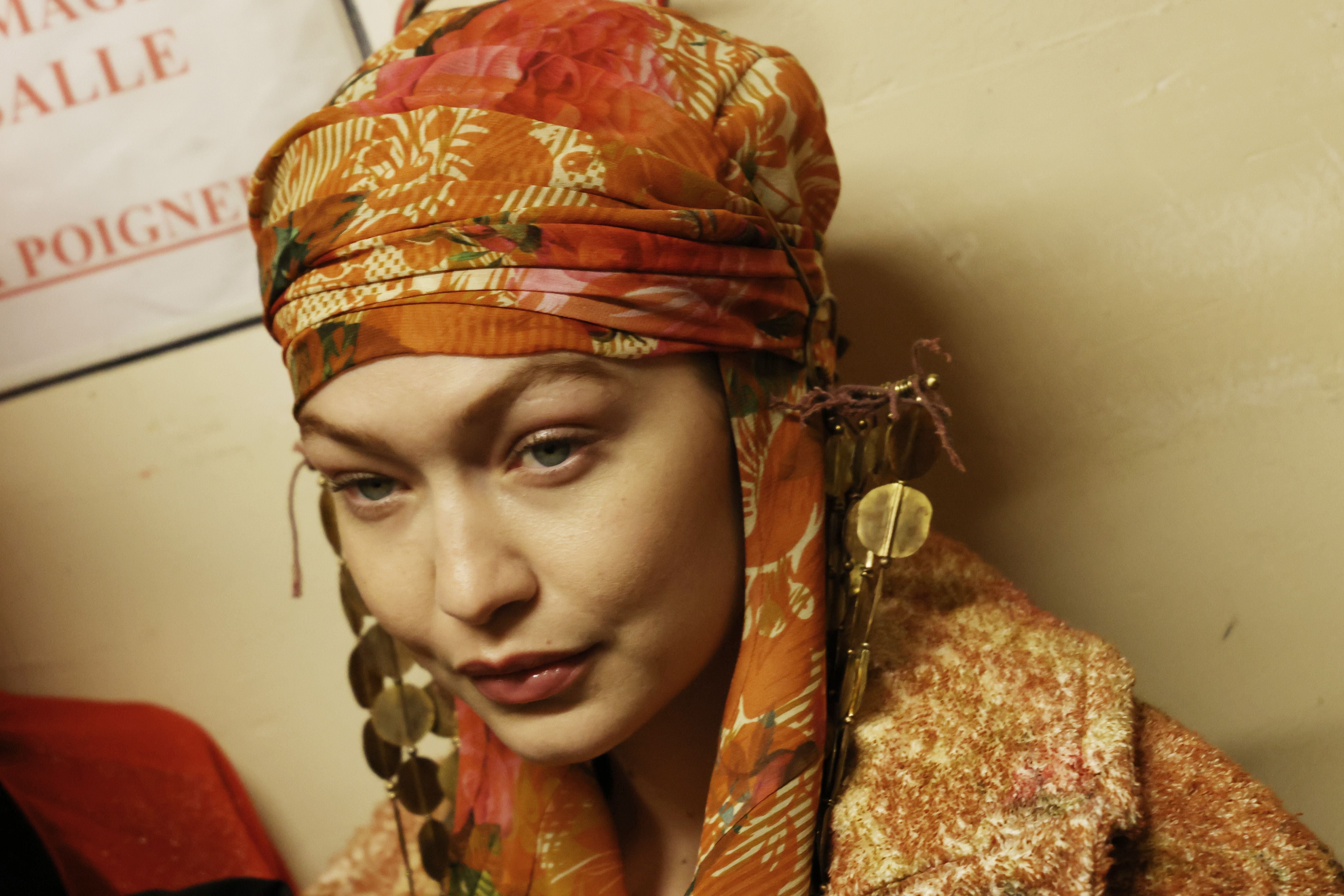 <p>Gigi Hadid poses backstage during the Paris Fashion Week on 5 March</p>