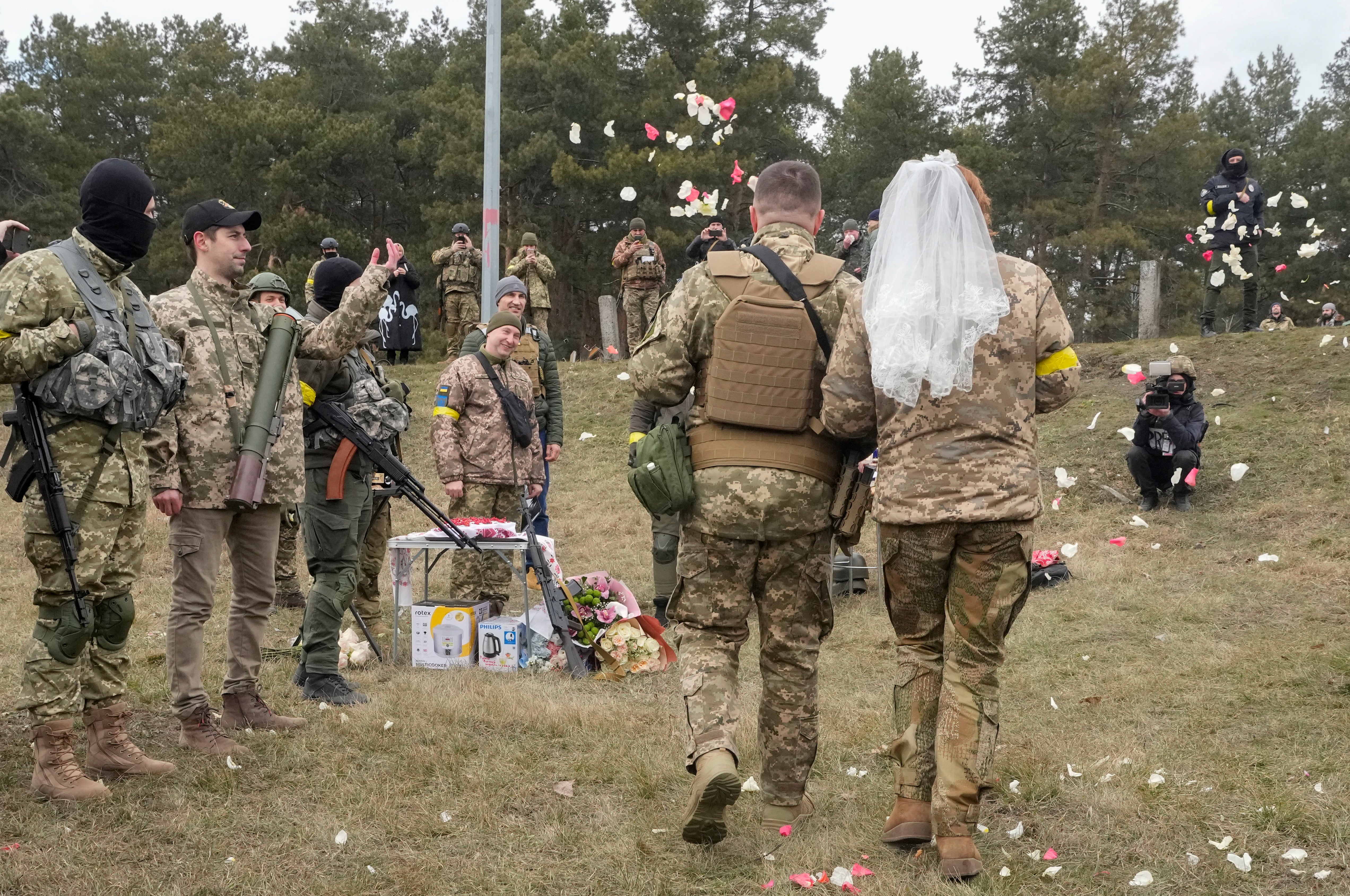 The couple married at a Kyiv checkpoint (Efrem Lukatsky/AP)