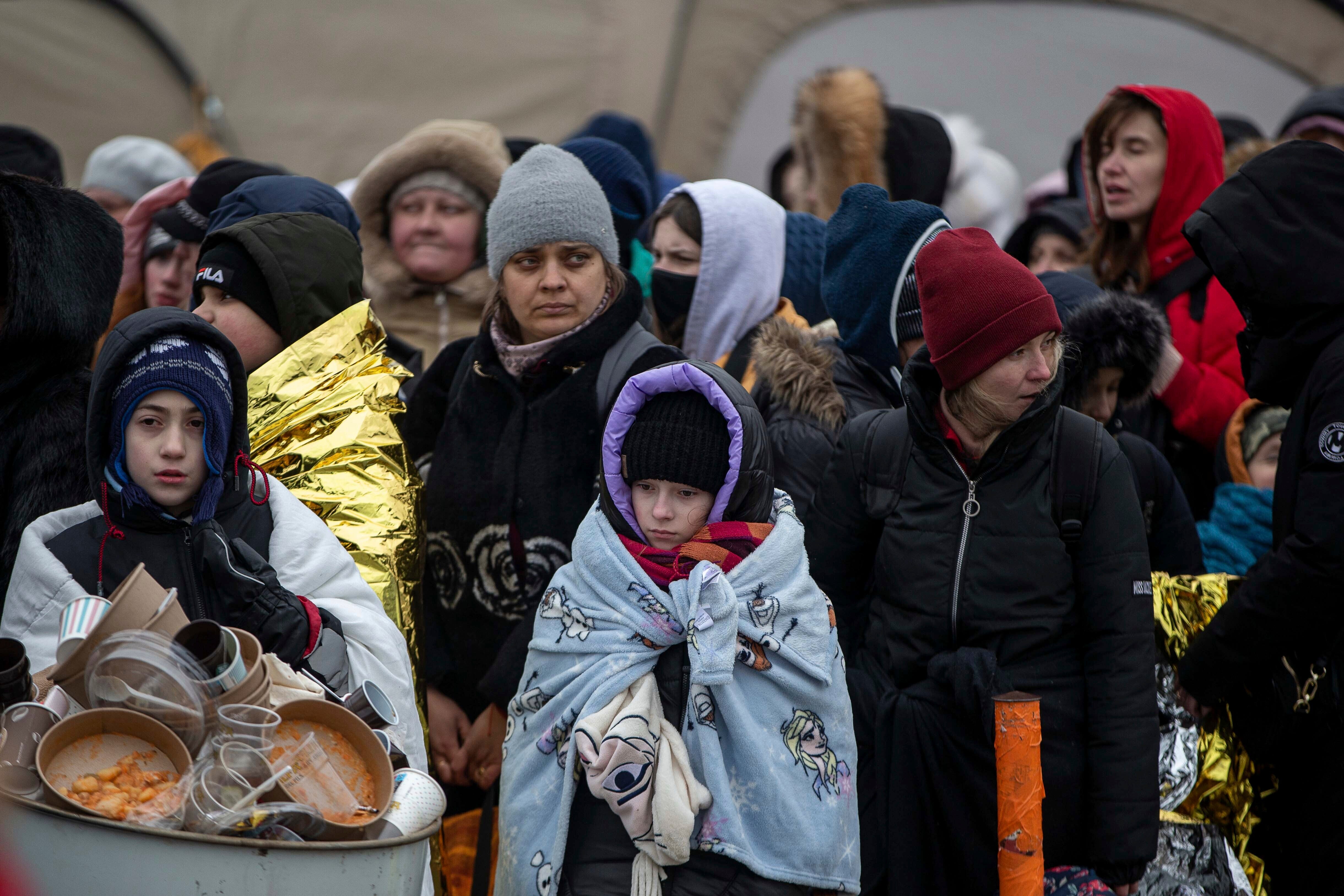 Refugees after fleeing from the Ukraine and arriving at the border crossing in Medyka, Poland, March 7, 2022