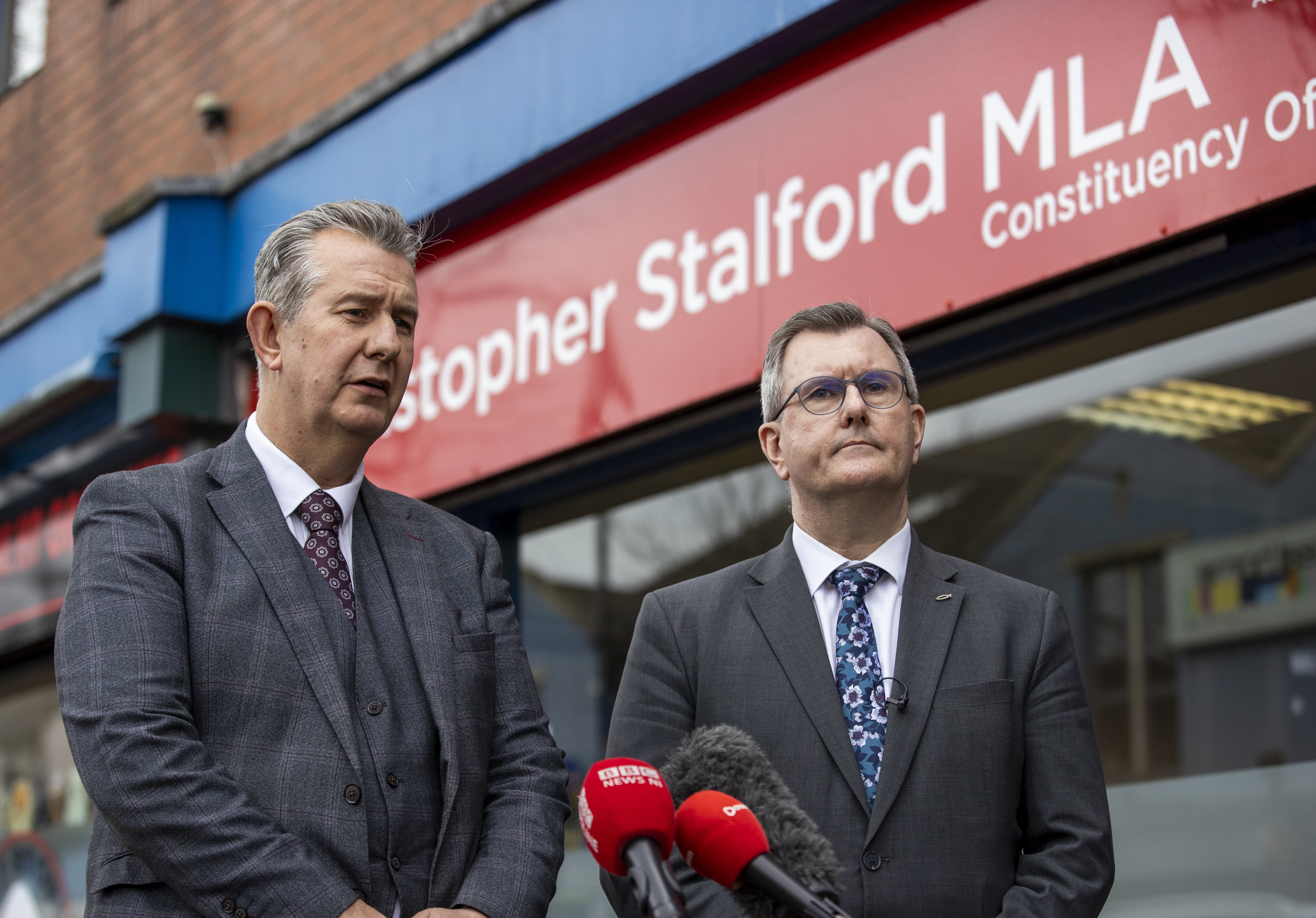 DUP leader Sir Jeffrey Donaldson (right) with his party colleague Edwin Poots at the constituency office of former colleague Christopher Stalford, who died suddenly in February, to announce that Mr Poots will be filling his constituency seat (Liam McBurney/PA)