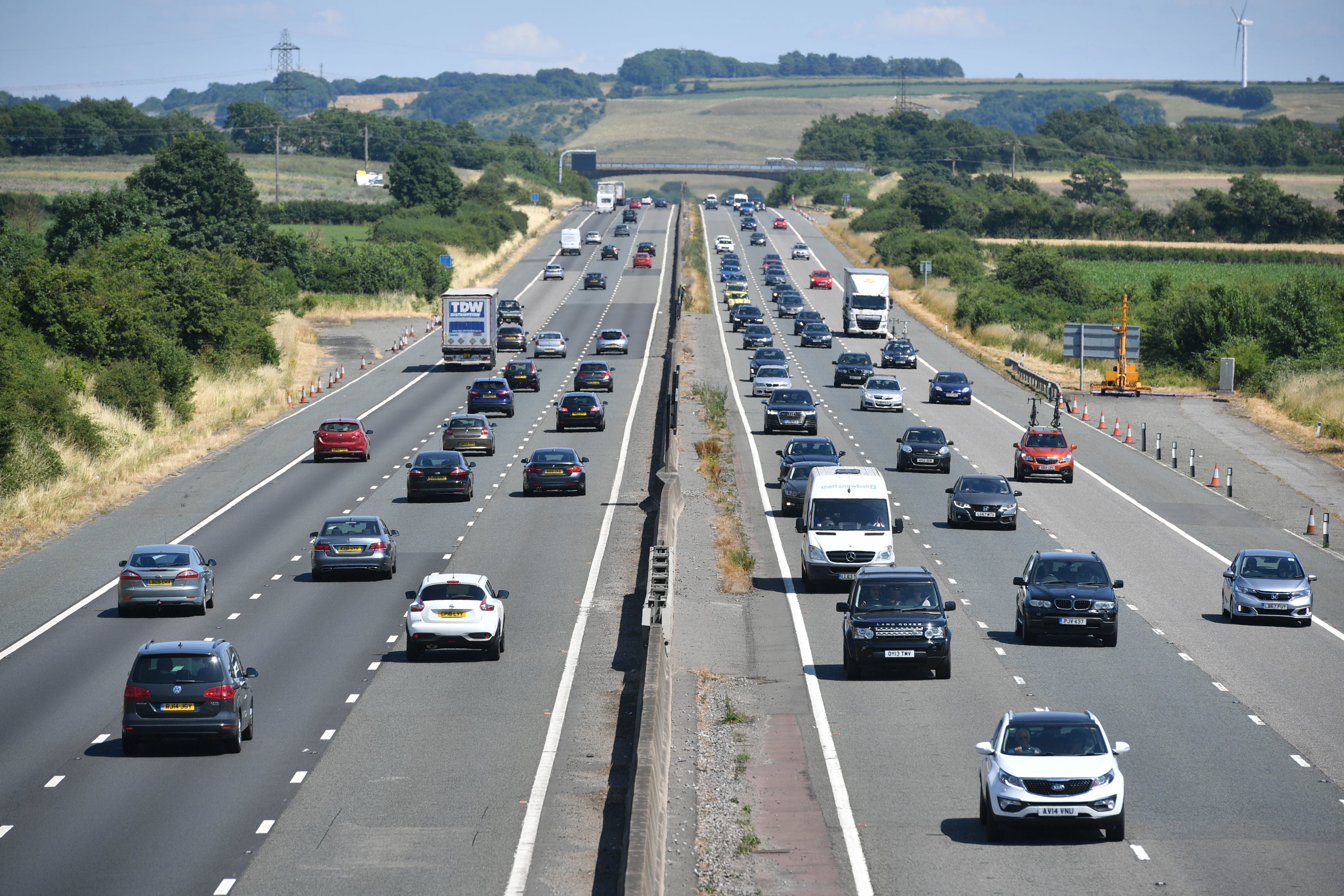 Vehicles drive along the M4 on 23 February, 2022.