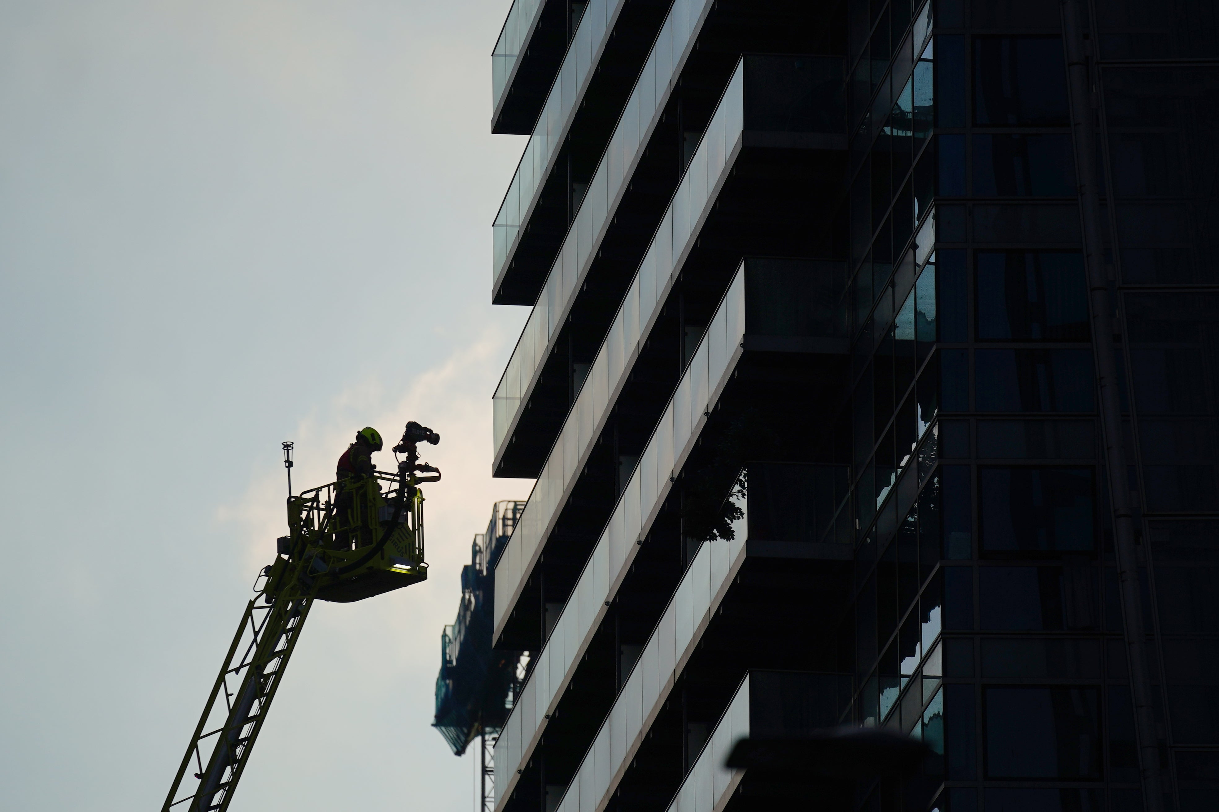 Fire crews are seen tending to the blaze in Whitechapel (Victoria Jones/PA)