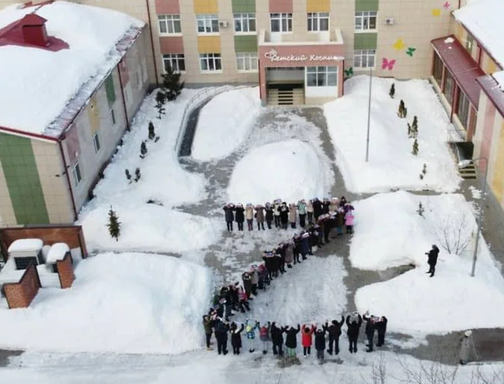 Children at a hospice centre stand in a “Z” formation to show support for Russia’s invasion of Ukraine