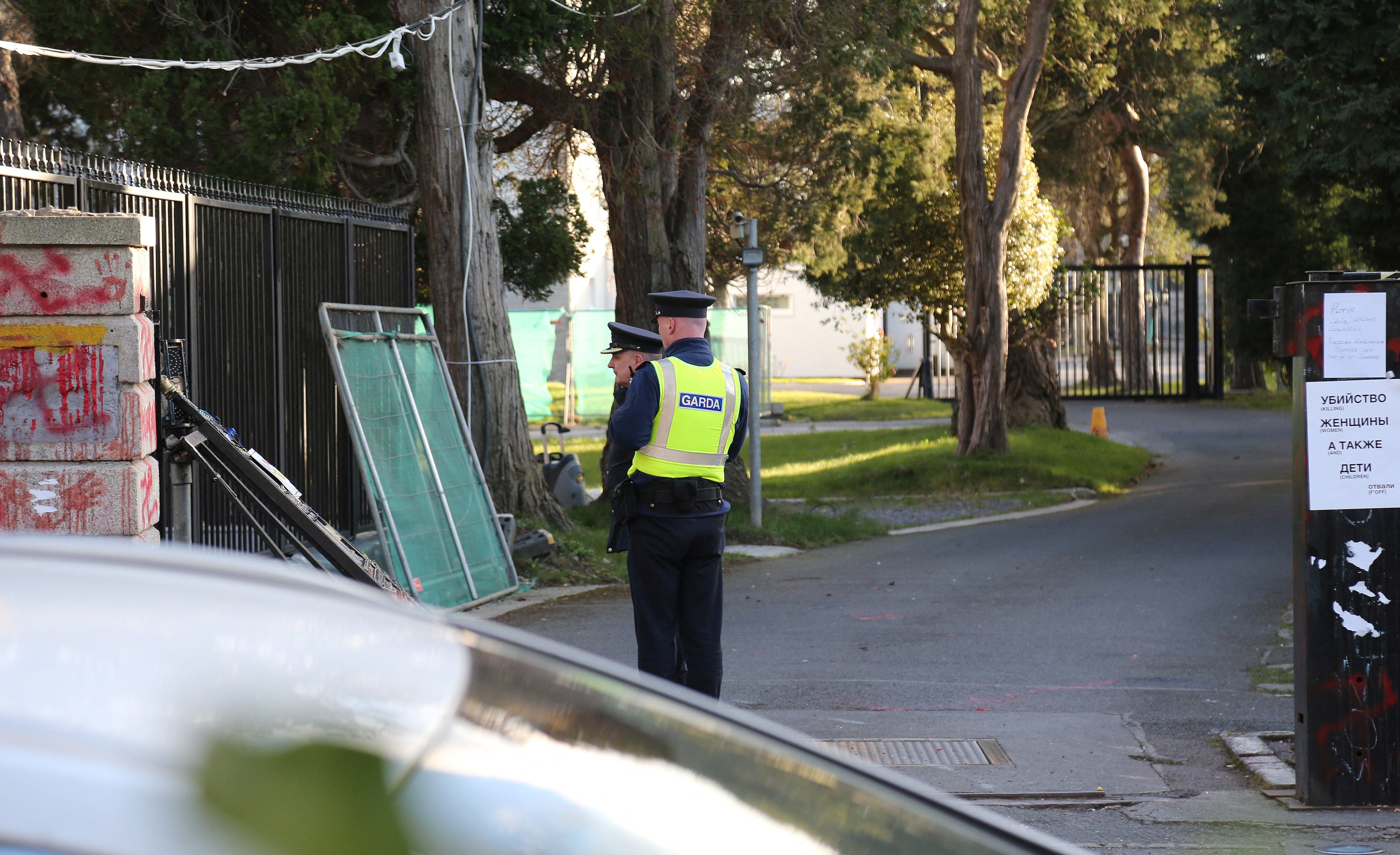 Police stand guard at the Russian embassy following the incident on Monday afternoon