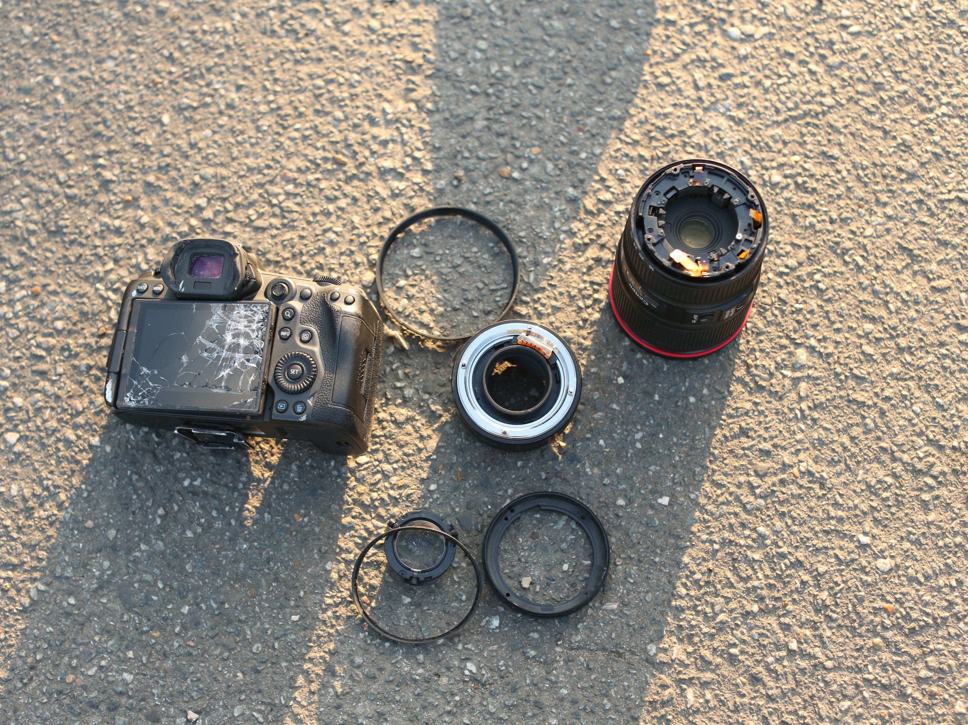 The damage caused to a camera after Dizzee Rascal, real name Dylan Mills, allegedly took a camera from a PA Media photographer outside Wimbledon Magistrates’ Court and threw it into a road, smashing it