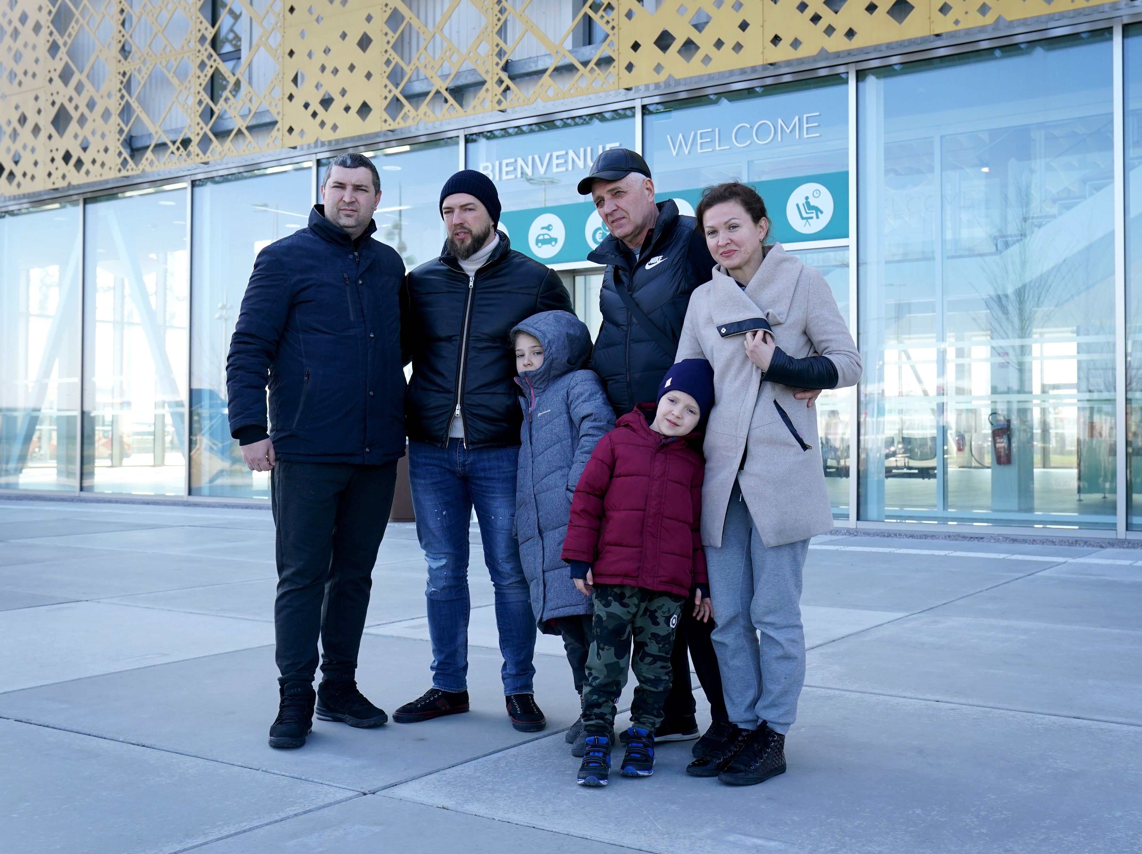 (Back row, left to right) Yevgen Morgun, Vitalii Morgun, Volodymyr Morgun and Anna Morgun with (front row, left to right) children Darya and Yehor arrive at the ferry terminal in Calais, France. Volodymyr Morgun and his son Vitalii Morgun travelled to Hungary to meet his other son Yevgen, his wife Anna and their children Darya and Yehor, after they fled the Ukraine following the Russian invasion. Picture date: Tuesday March 8, 2022.