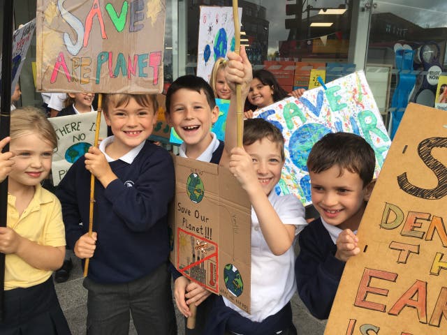 <p>Children on a climate march in Kingston, southwest London </p>