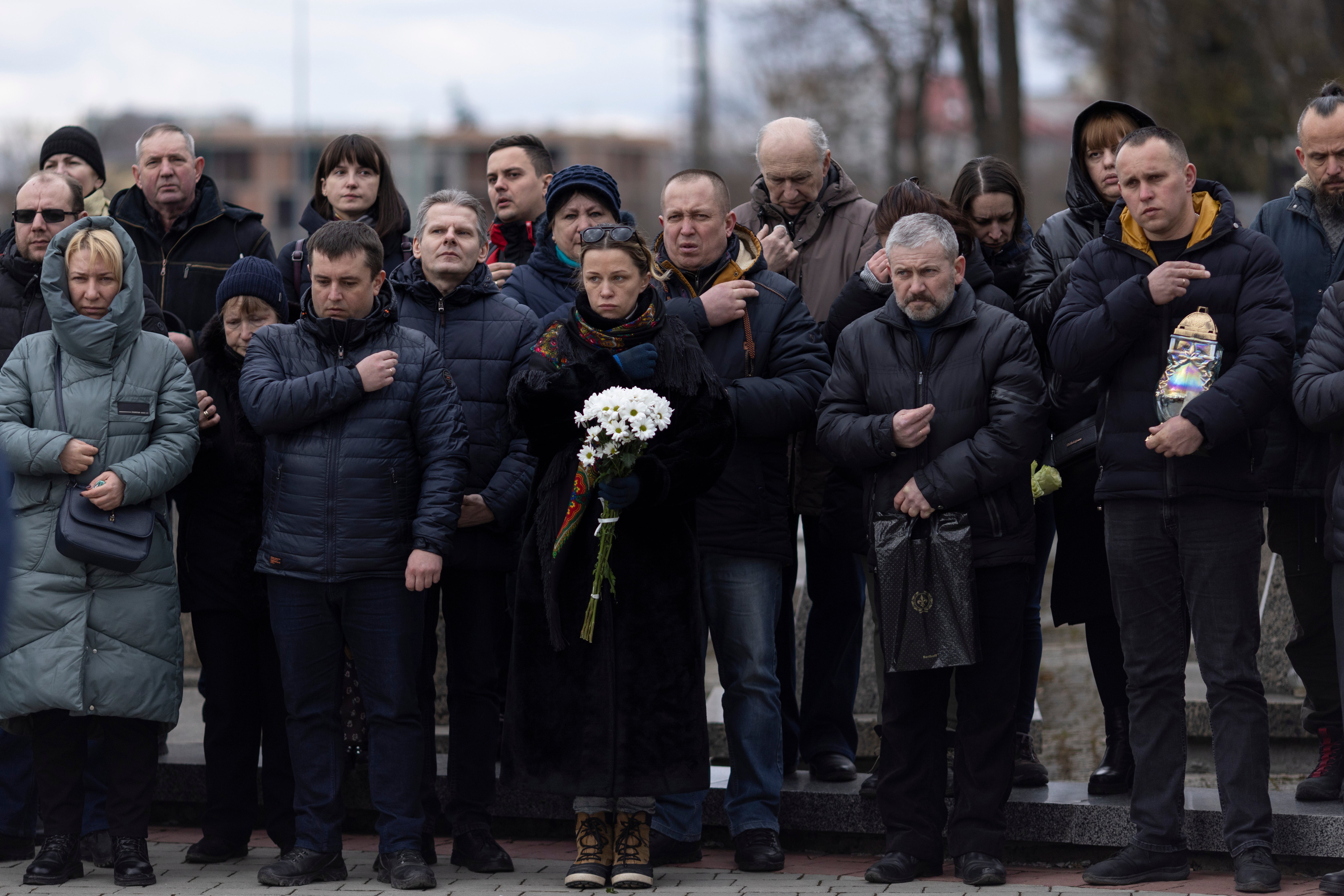 A service takes place at Lychakiv cemetery during a joint funeral for two soldiers who died in the east of the country during recent fighting