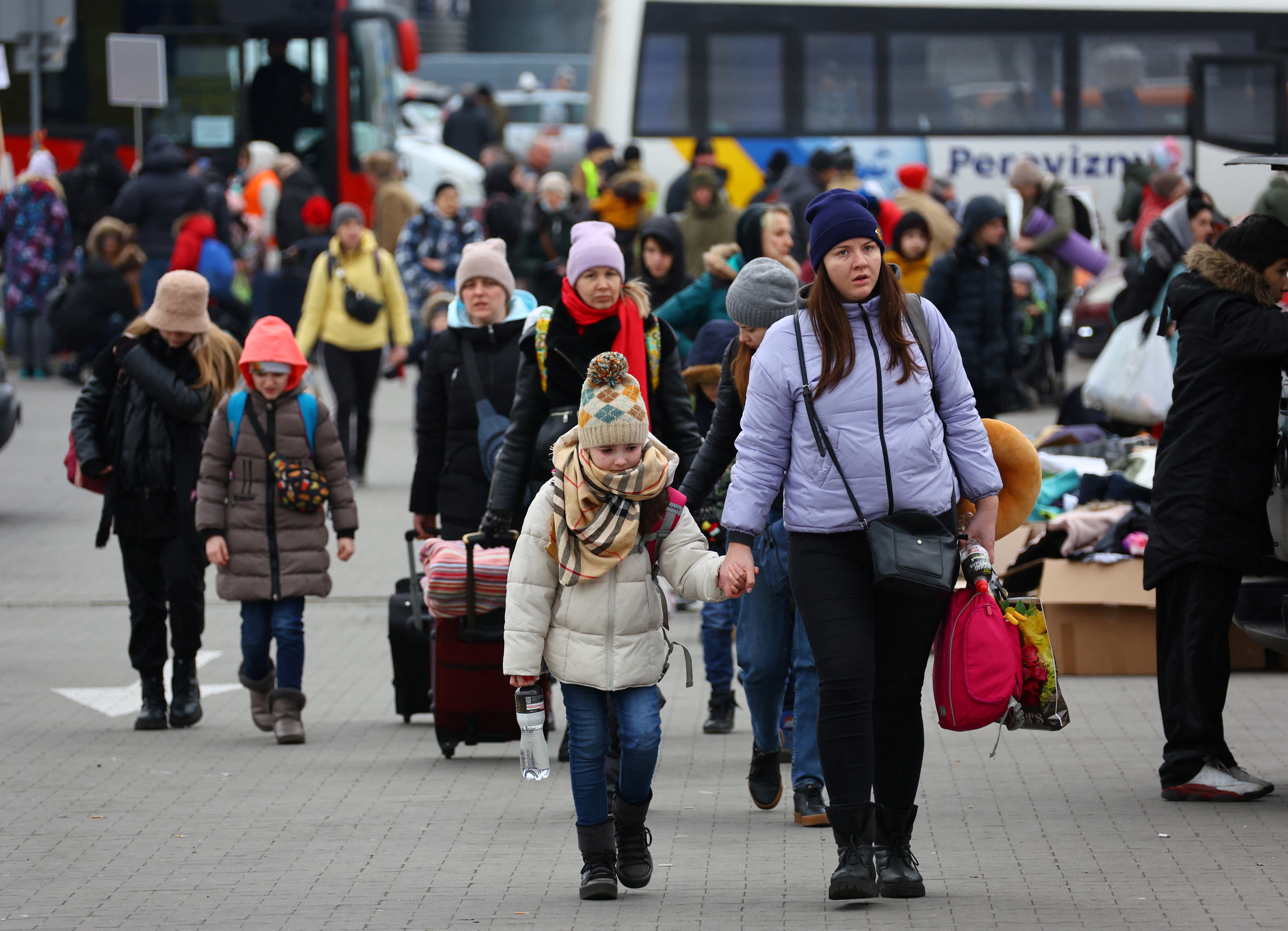 Refugees arrive to a temporary accommodation and transport hub in Przemysl, Poland