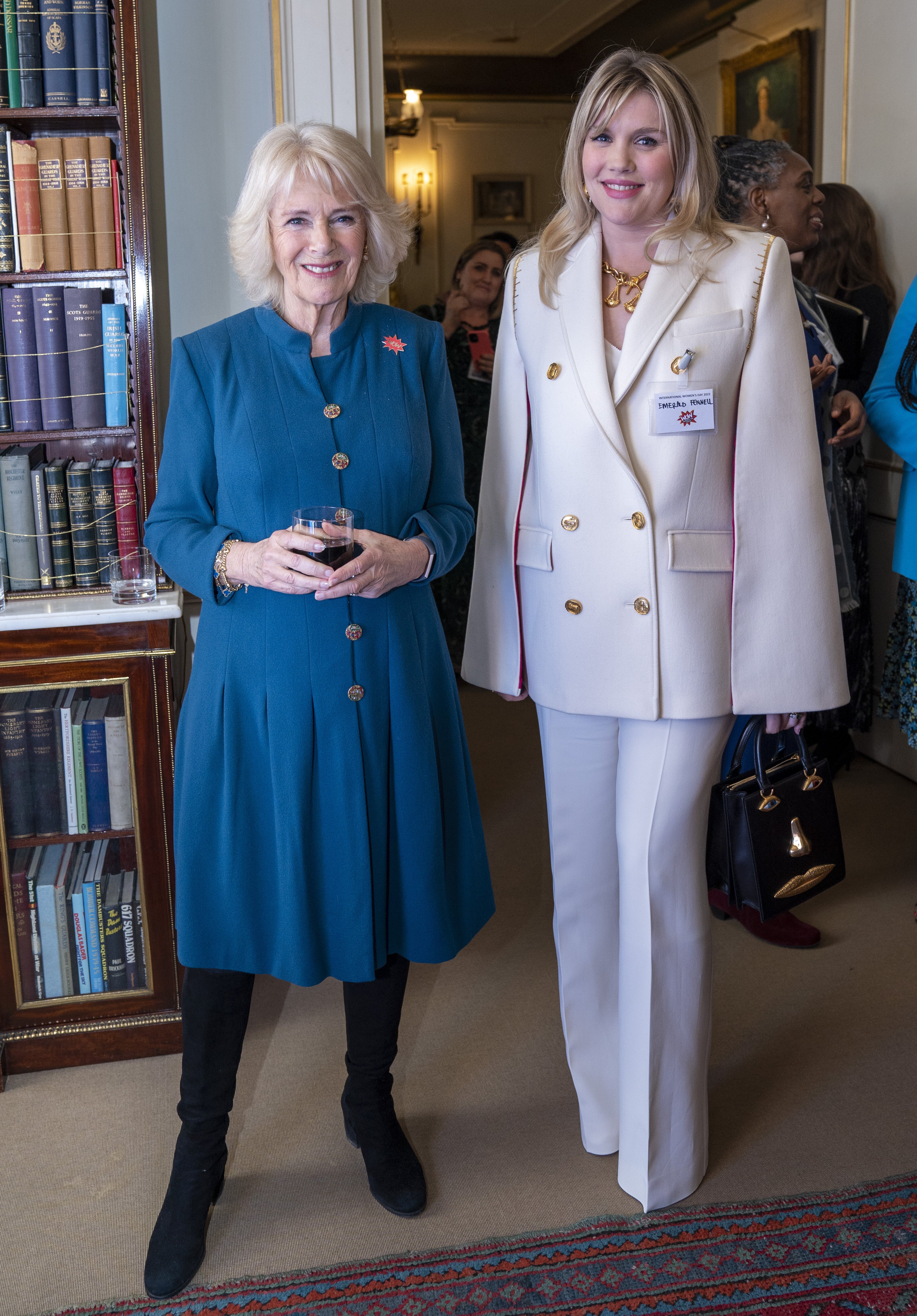 The Duchess of Cornwall speaks to actress Emerald Fennell, who played Camilla in TV’s The Crown, at a Clarence House reception to mark International Women’s Day (Arthur Edwards/The Sun/PA)