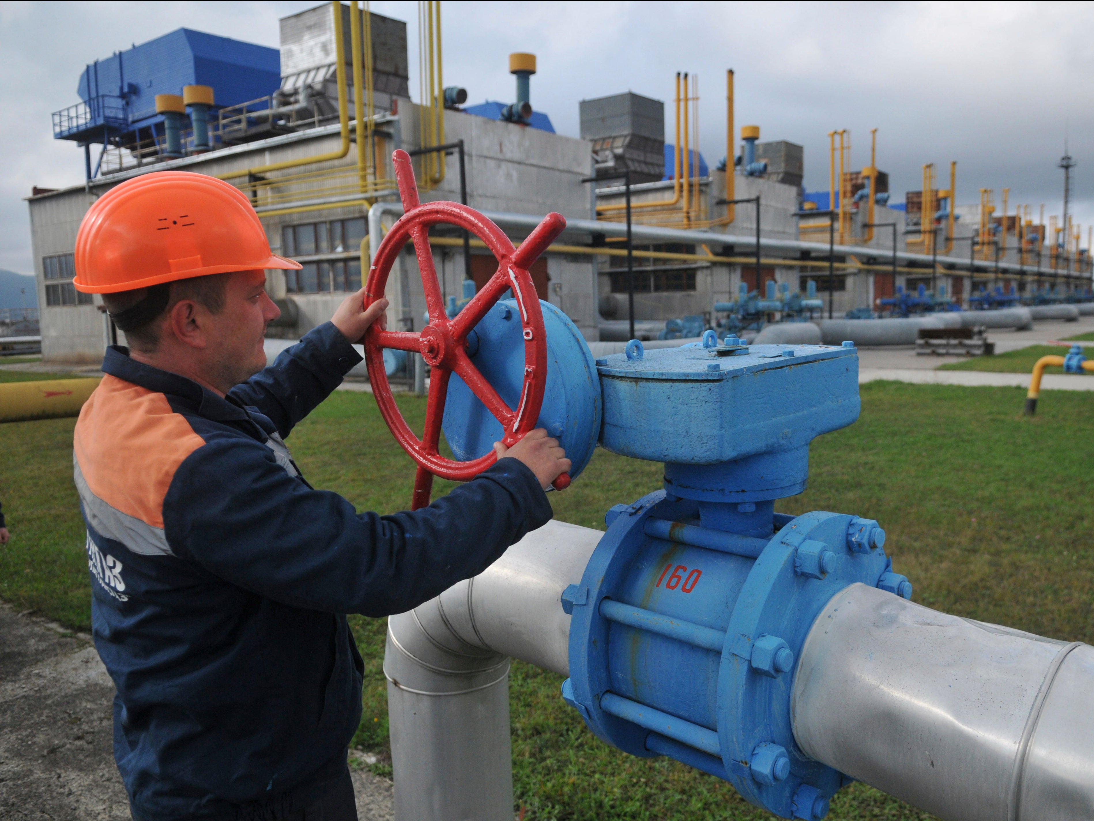 A worker at a Ukrainian gas station in Volovets, western Ukraine. ‘Let’s dash into renewables at lightning speed’, the European Commission’s Frans Timmermans says