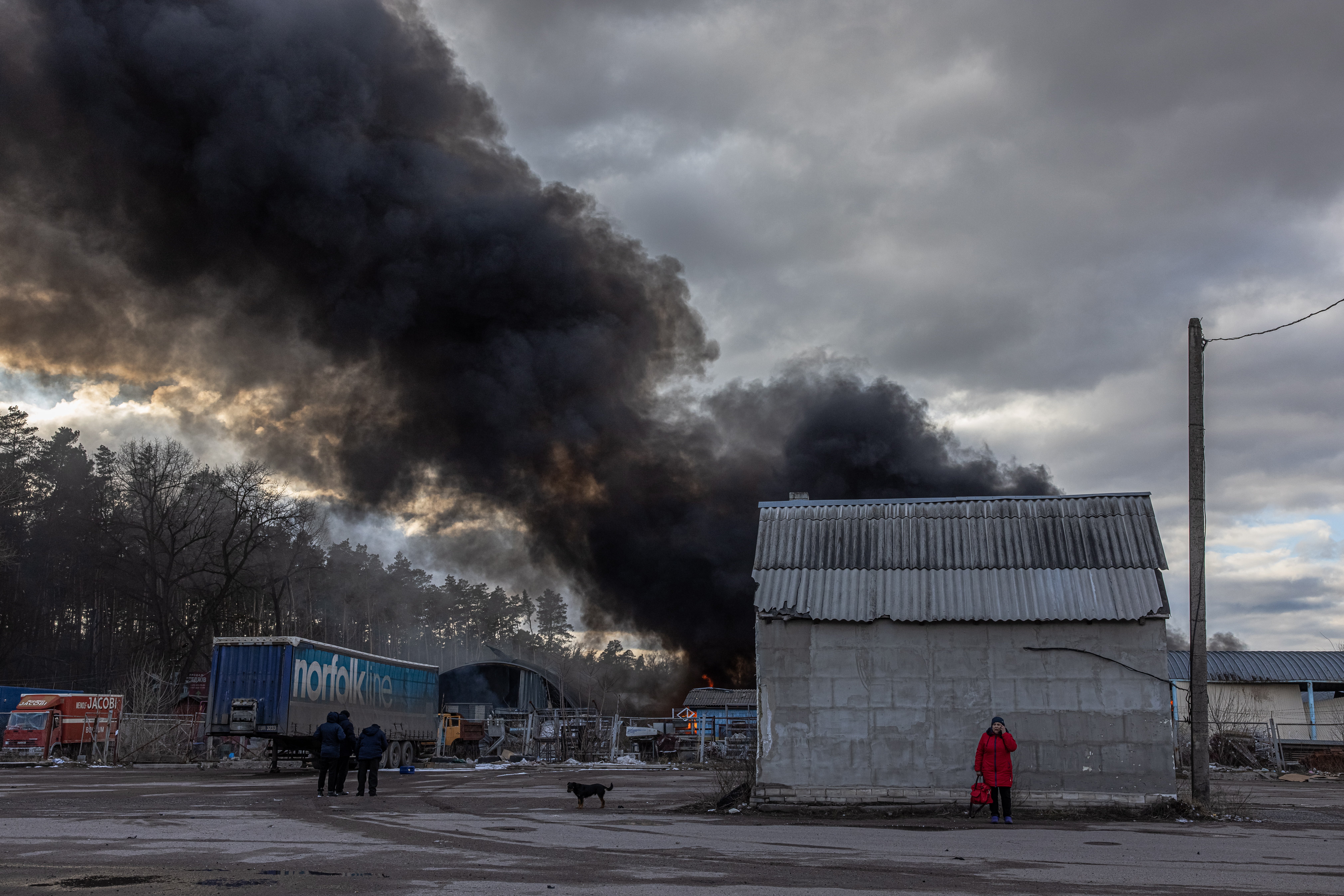 Smoke rises from a warehouse after a Russian Kalibr missile is shot down over Kalynivka village, near Brovary, on the eastern front line in Kyiv