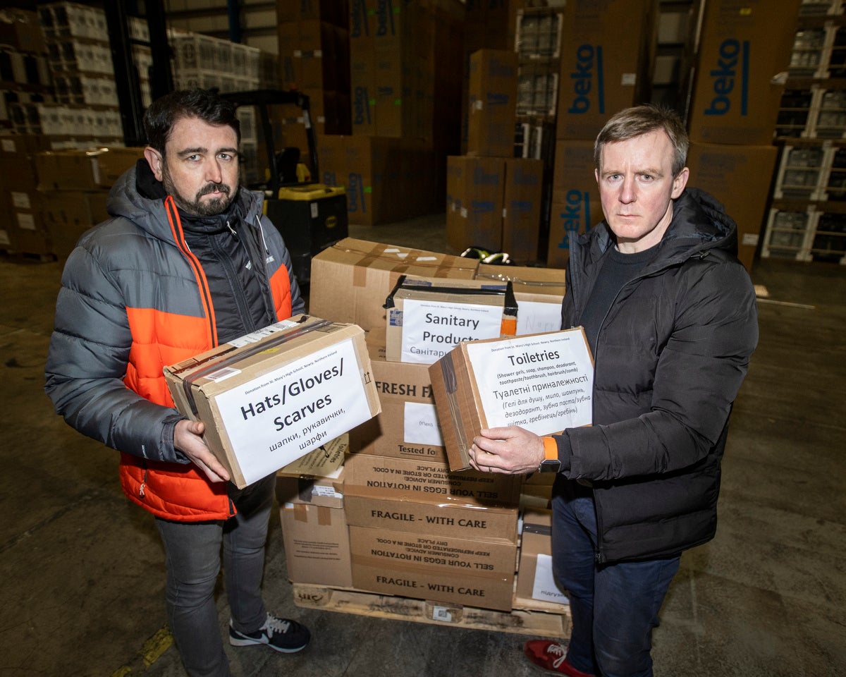 Paul Doherty, founder of Woodstock in west Belfast and SDLP MLA Justin McNulty (Liam McBurney/PA)