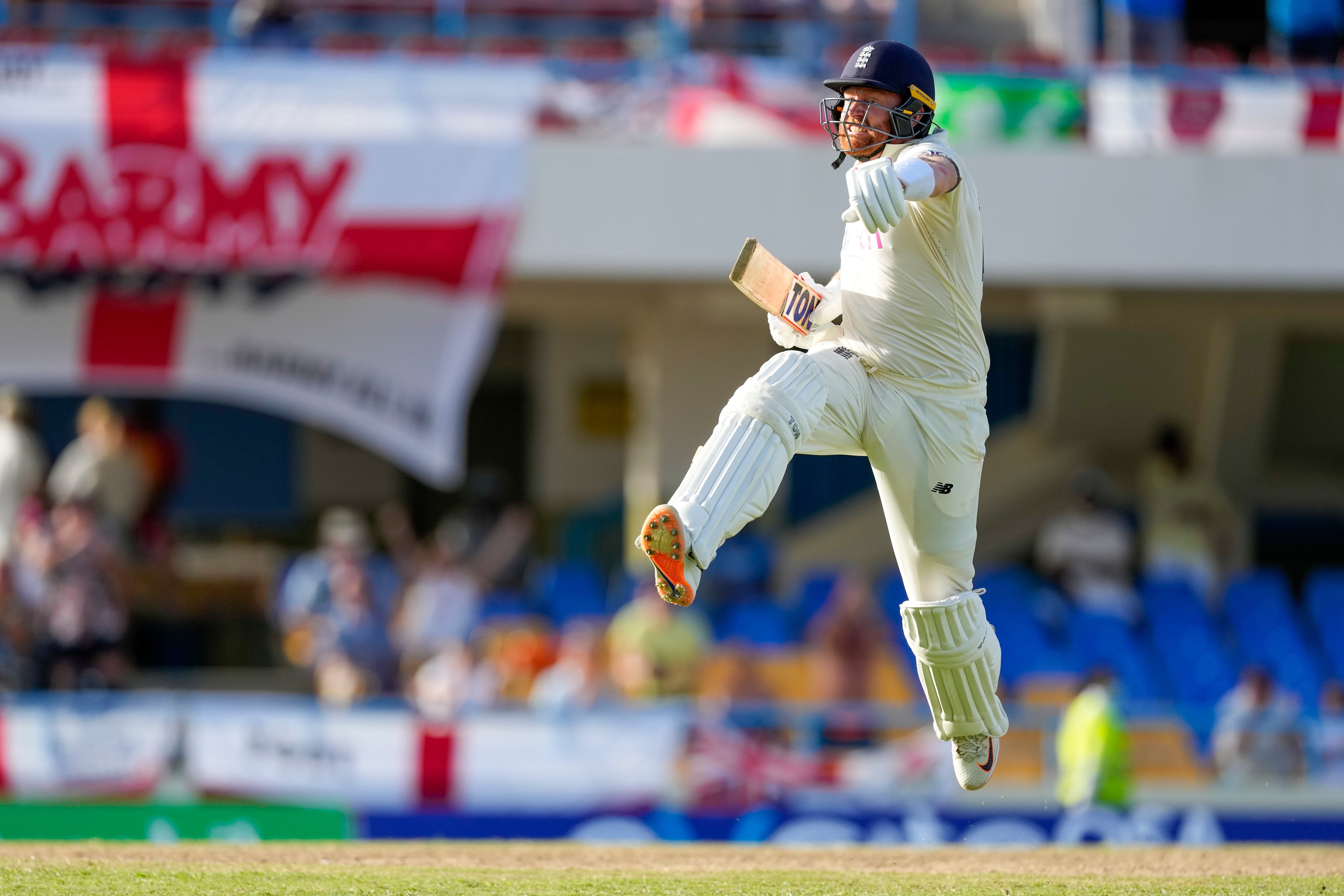 Jonny Bairstow celebrates his century in Antigua (Ricardo Mazalan/AP)