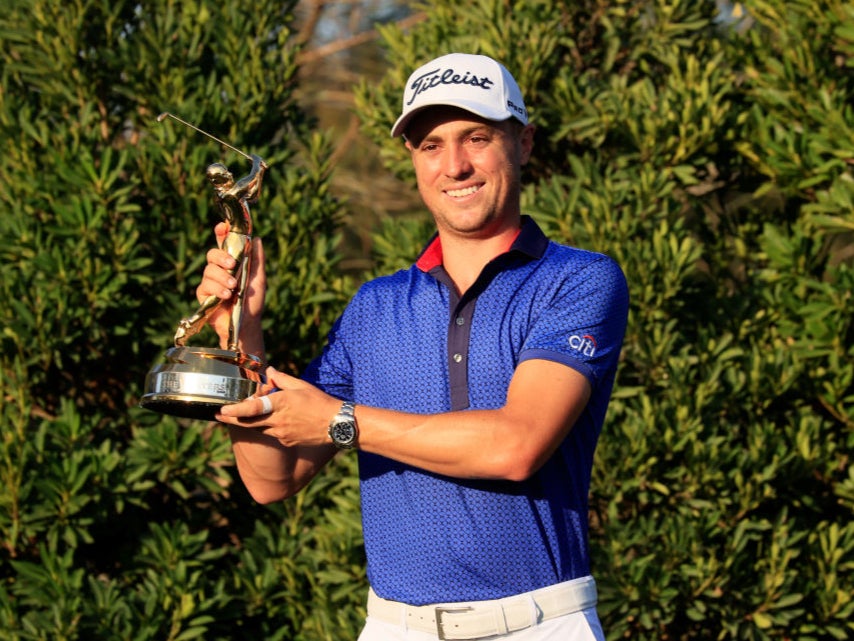 Justin Thomas celebrates winning the Players’ Championship in 2021