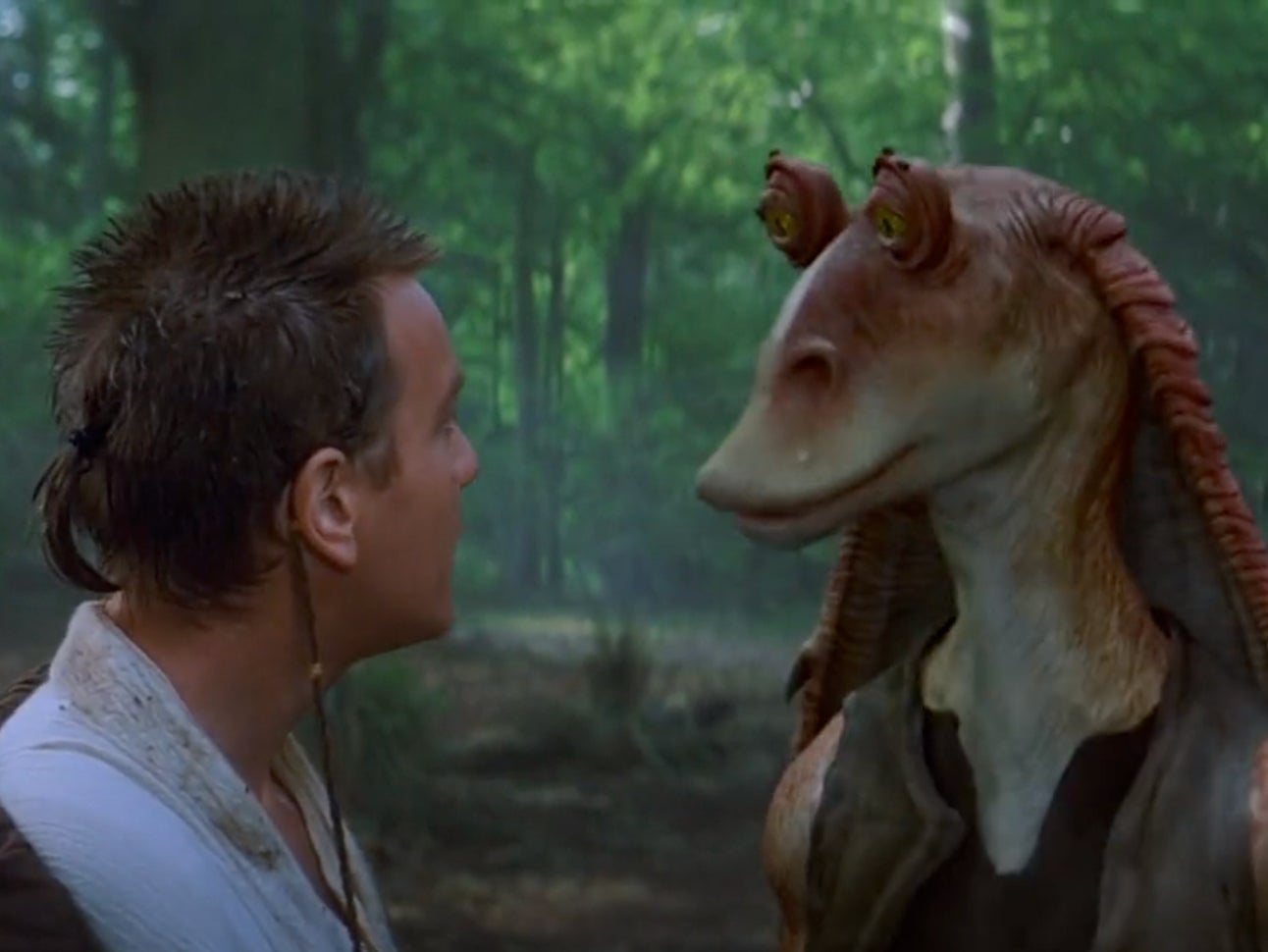 Obi-Wan Kenobi (Ewan McGregor) and Jar Jar Binks (Ahmed Best) in ‘The Phantom Menace’