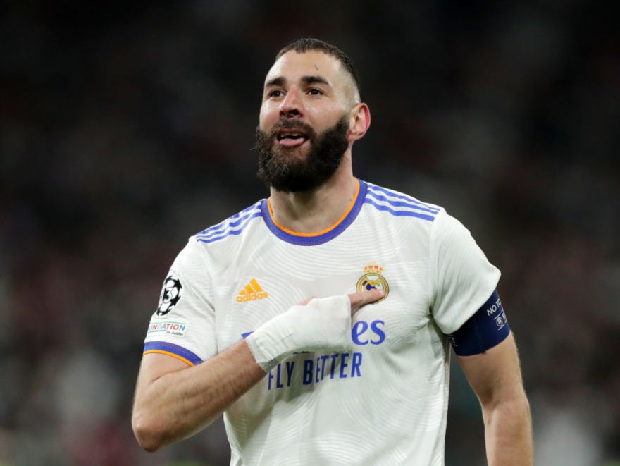 Karim Benzema celebrates after completing his hat-trick