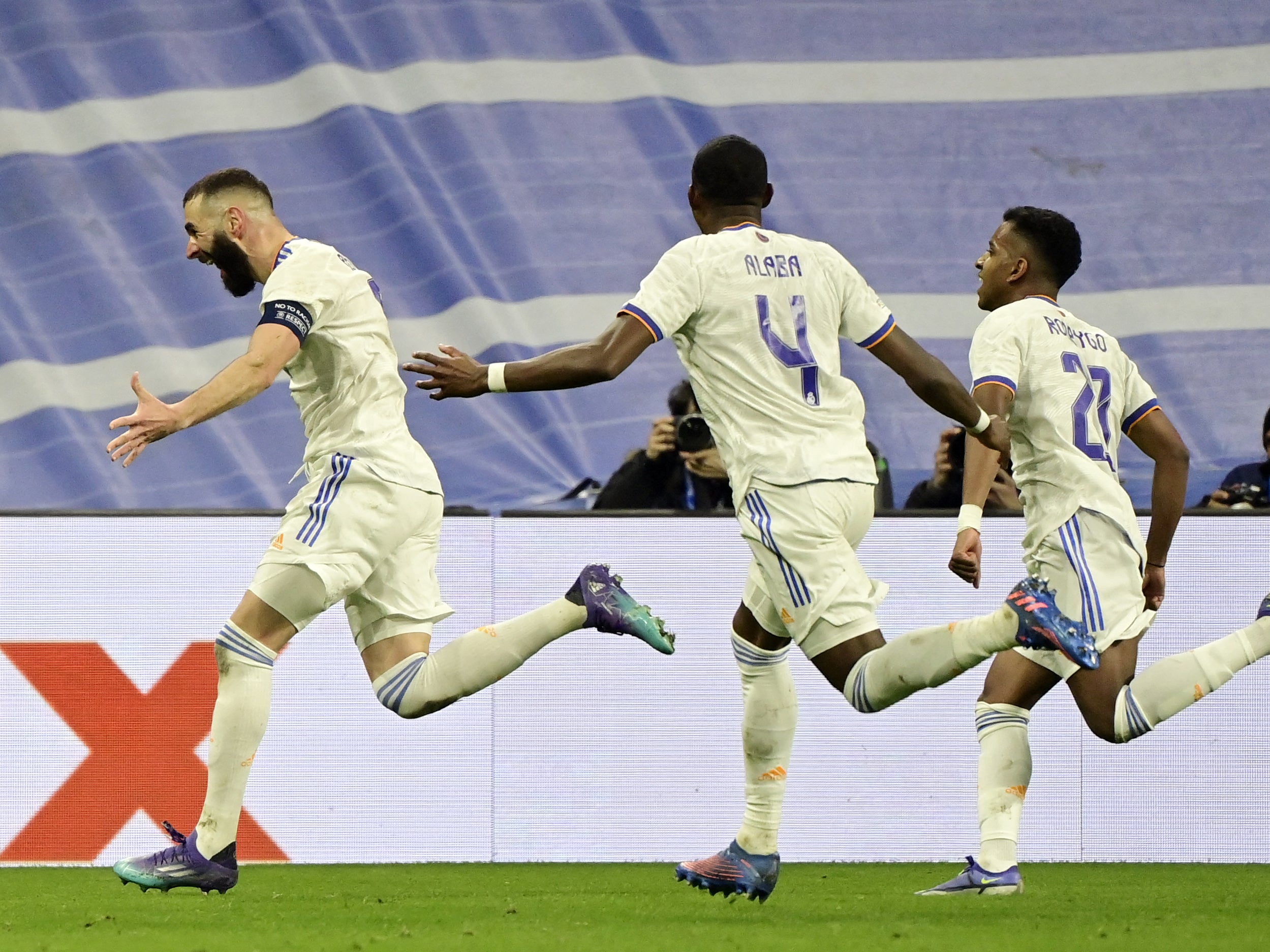 Karim Benzema celebrates completing his hat-trick