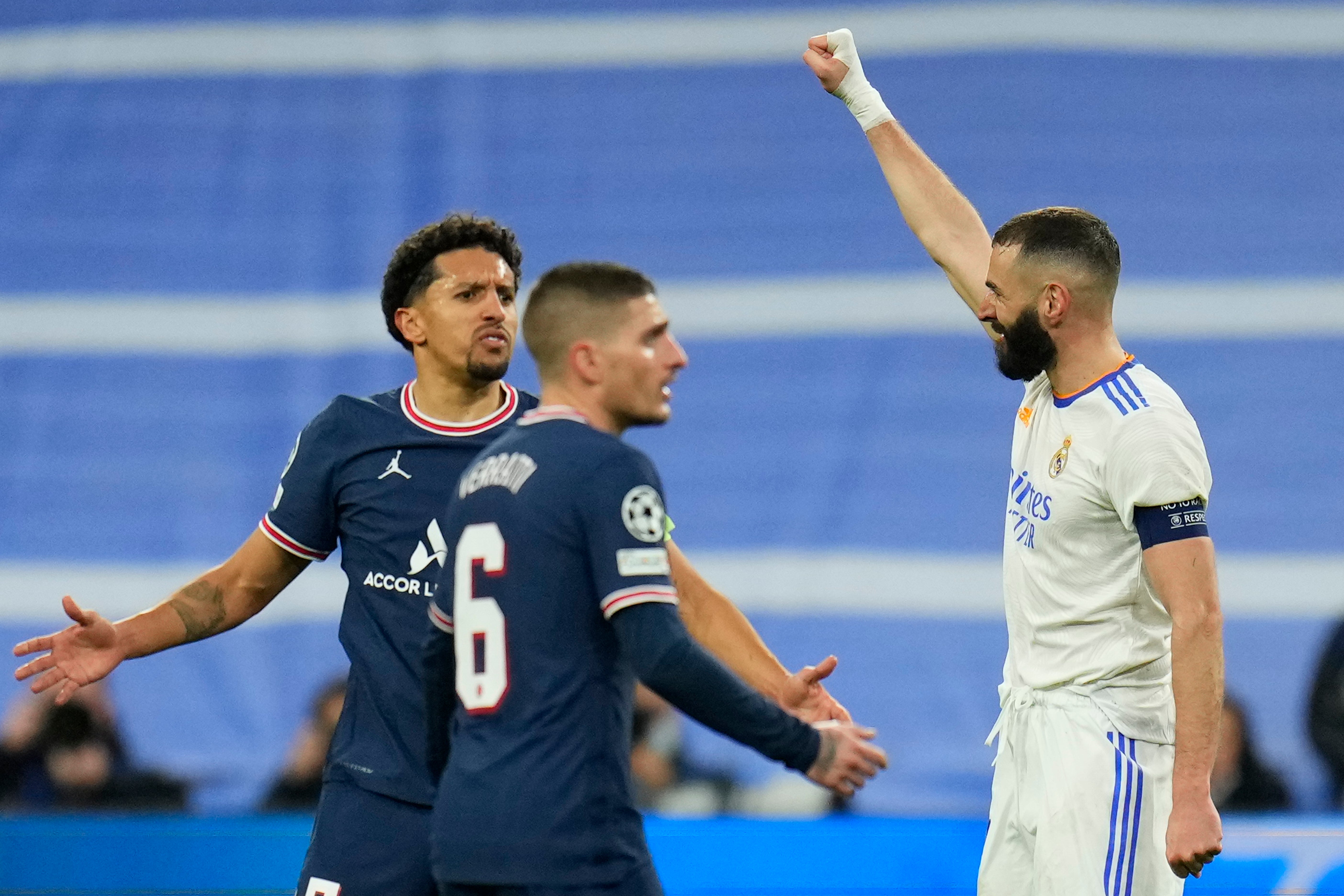 Karim Benzema celebrates scoring for Real Madrid against Paris St Germain (Manu Fernandez/AP/PA)