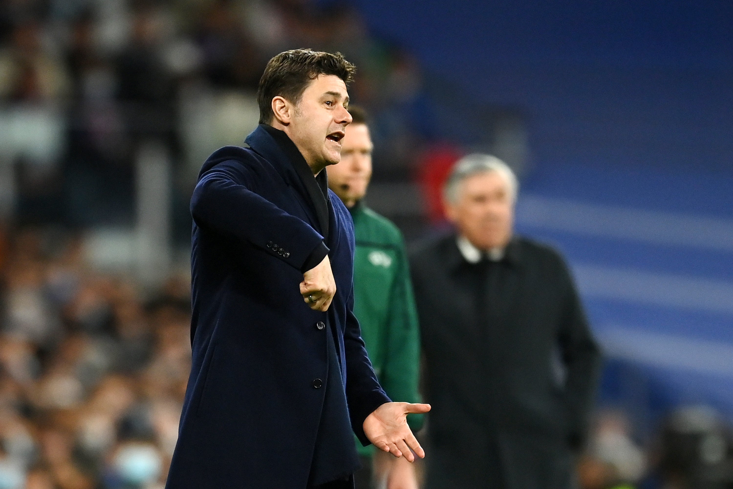 Mauricio Pochettino attempts to direct from the touchline