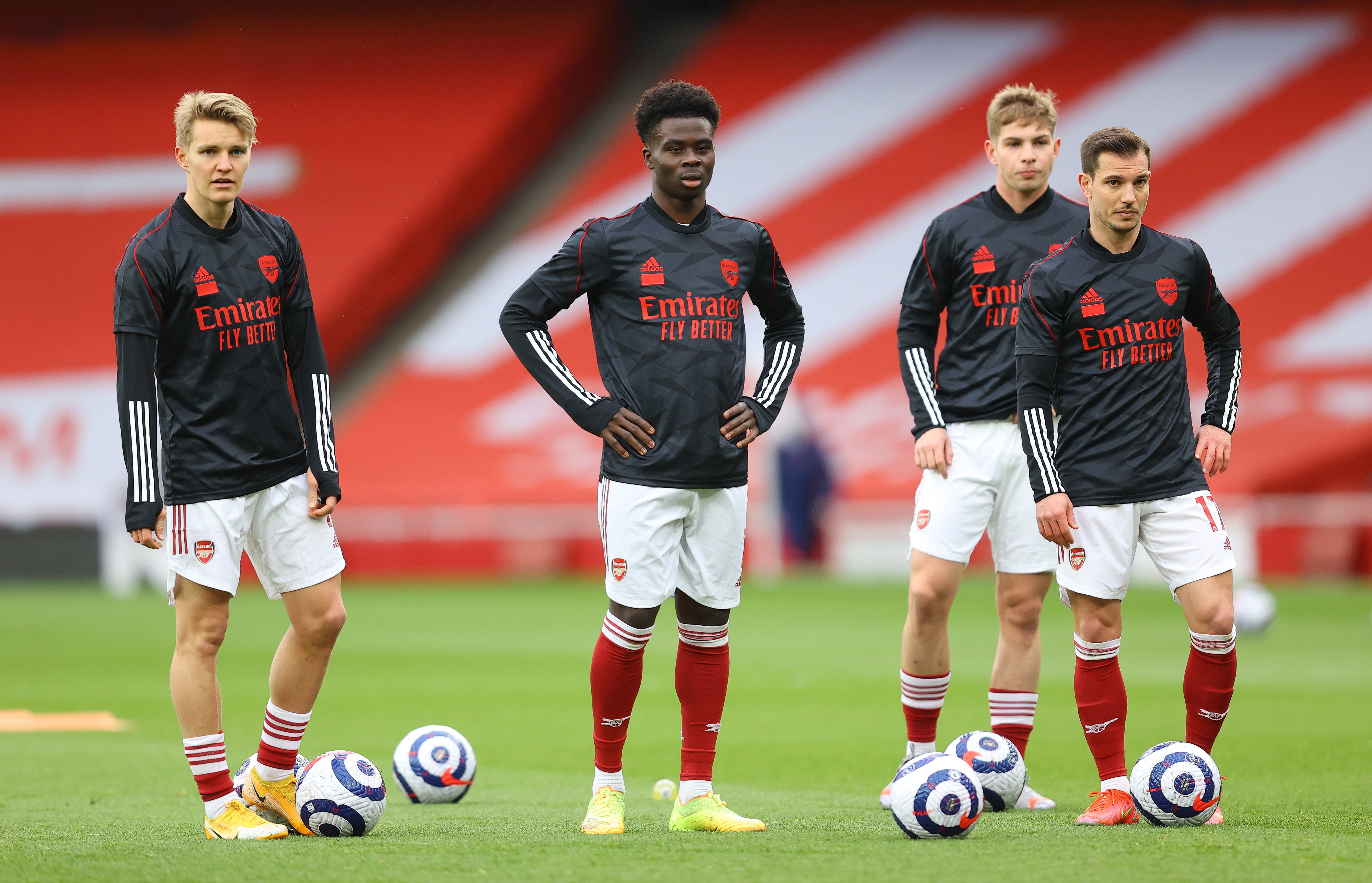 Arsenal’s Martin Odegaard, Bukayo Saka, Emile Smith Rowe and Cedric Soares