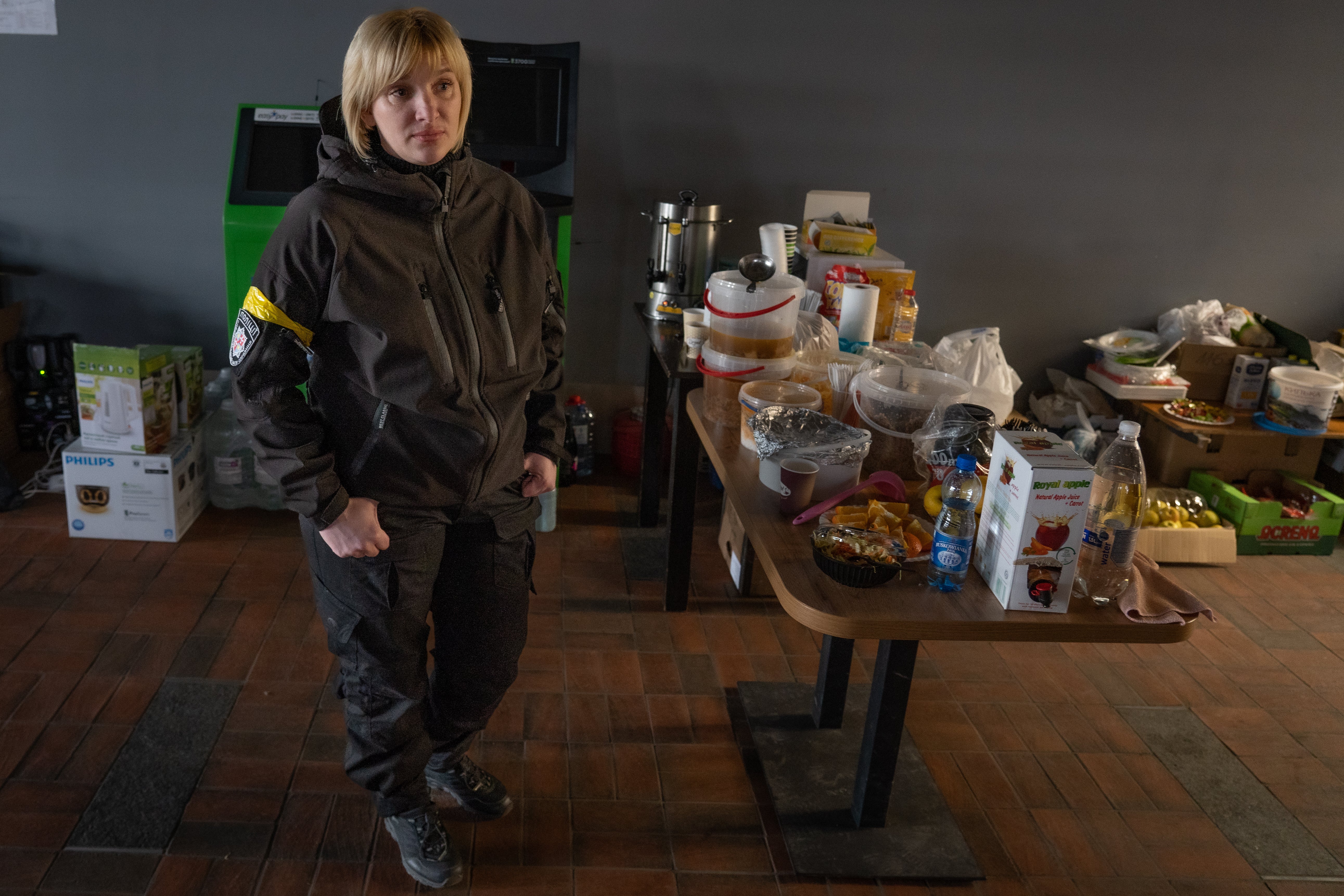 Lydia on security duty at a mall in Vinnytsia where she is chairperson of the local civilian defence force