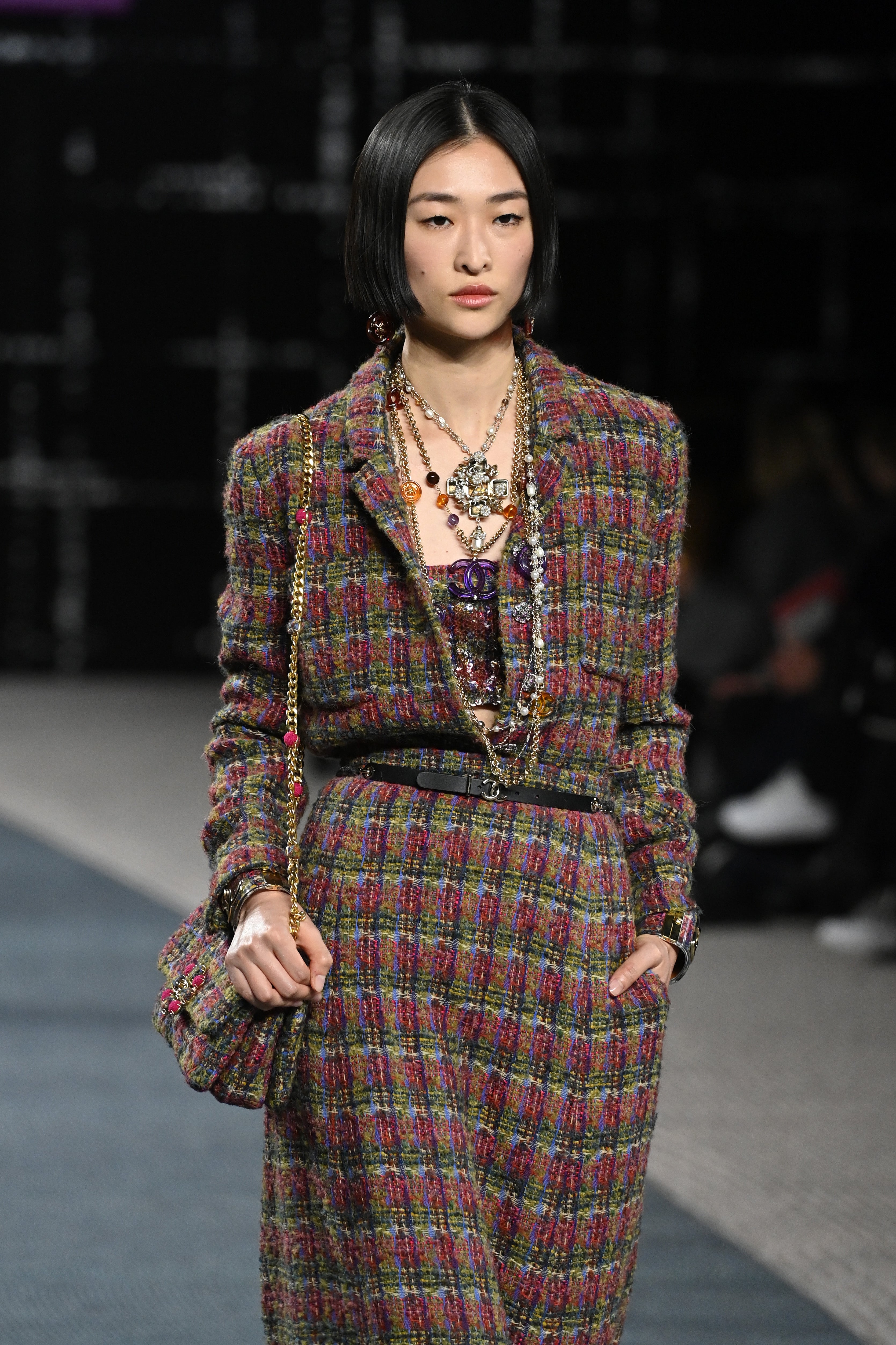 A model walks in the Chanel A/W 2022 show at Paris Fashion Week