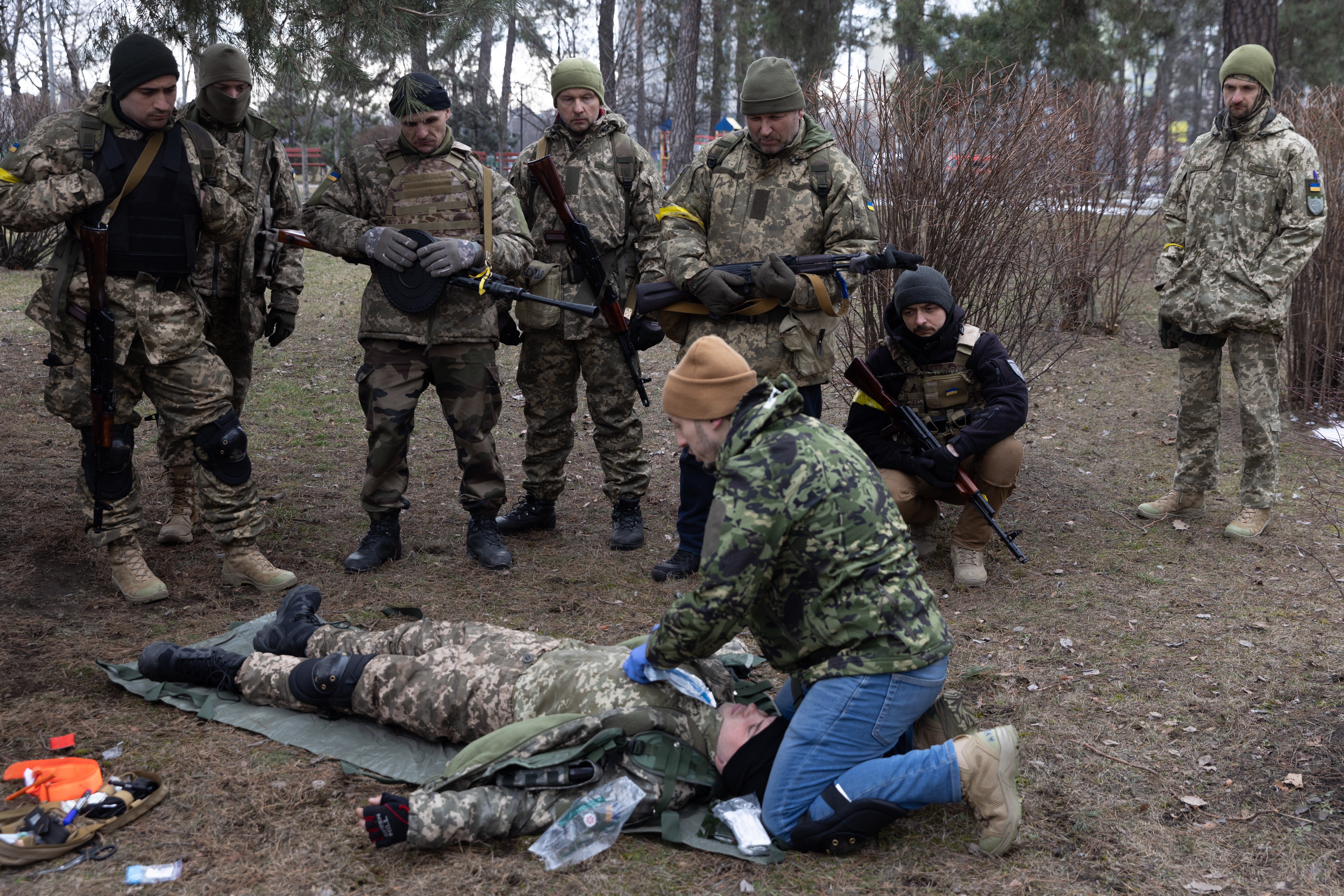 File photo: Members of the territorial defence forces learn first aid during a training session held in a public park in Kyiv, 9 March 2022