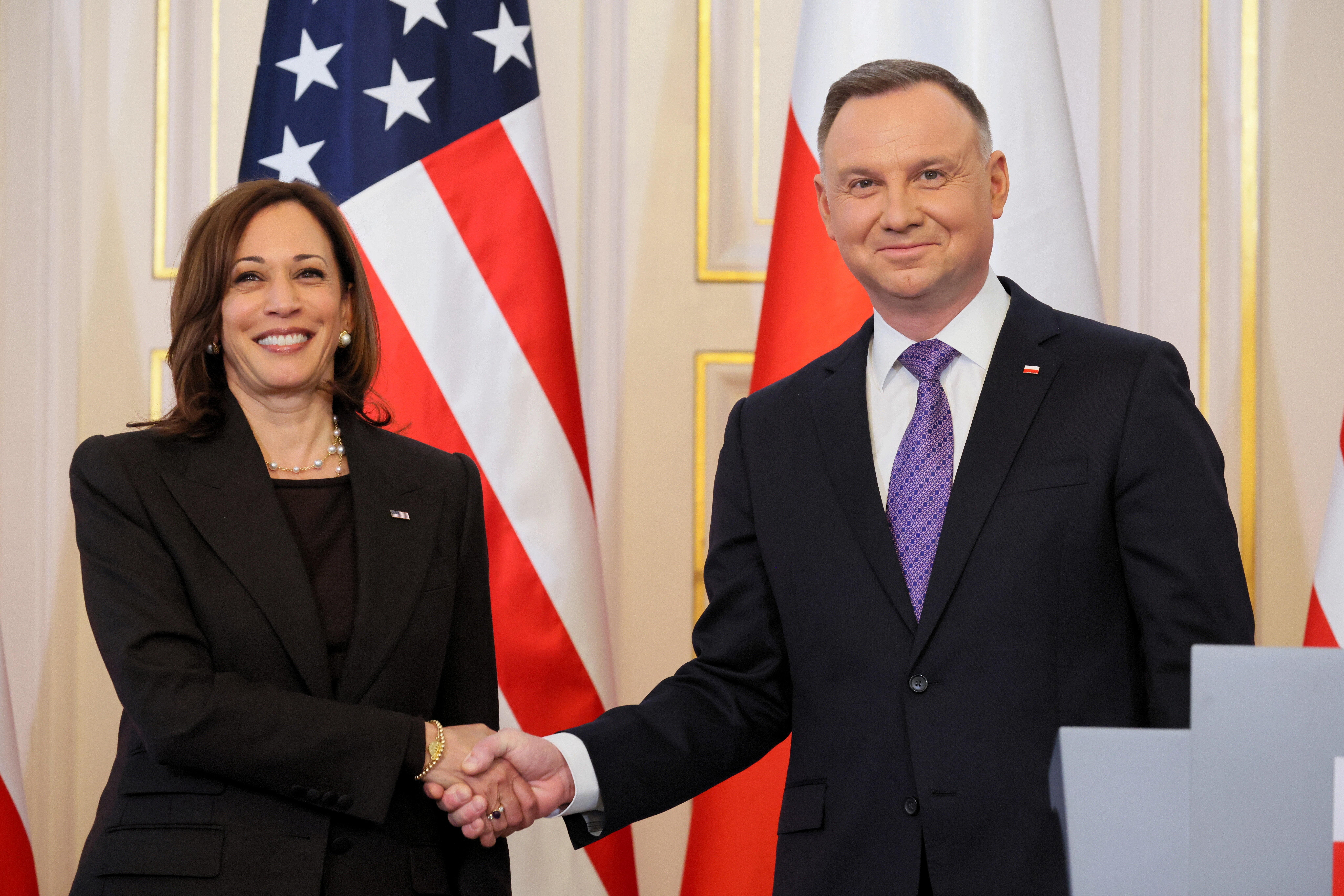 Vice president Kamala Harris (L) and Polish President Andrzej Duda (R) attend a press conference after their meeting at the Belvedere Palace in Warsaw, Poland, 10 March 2022