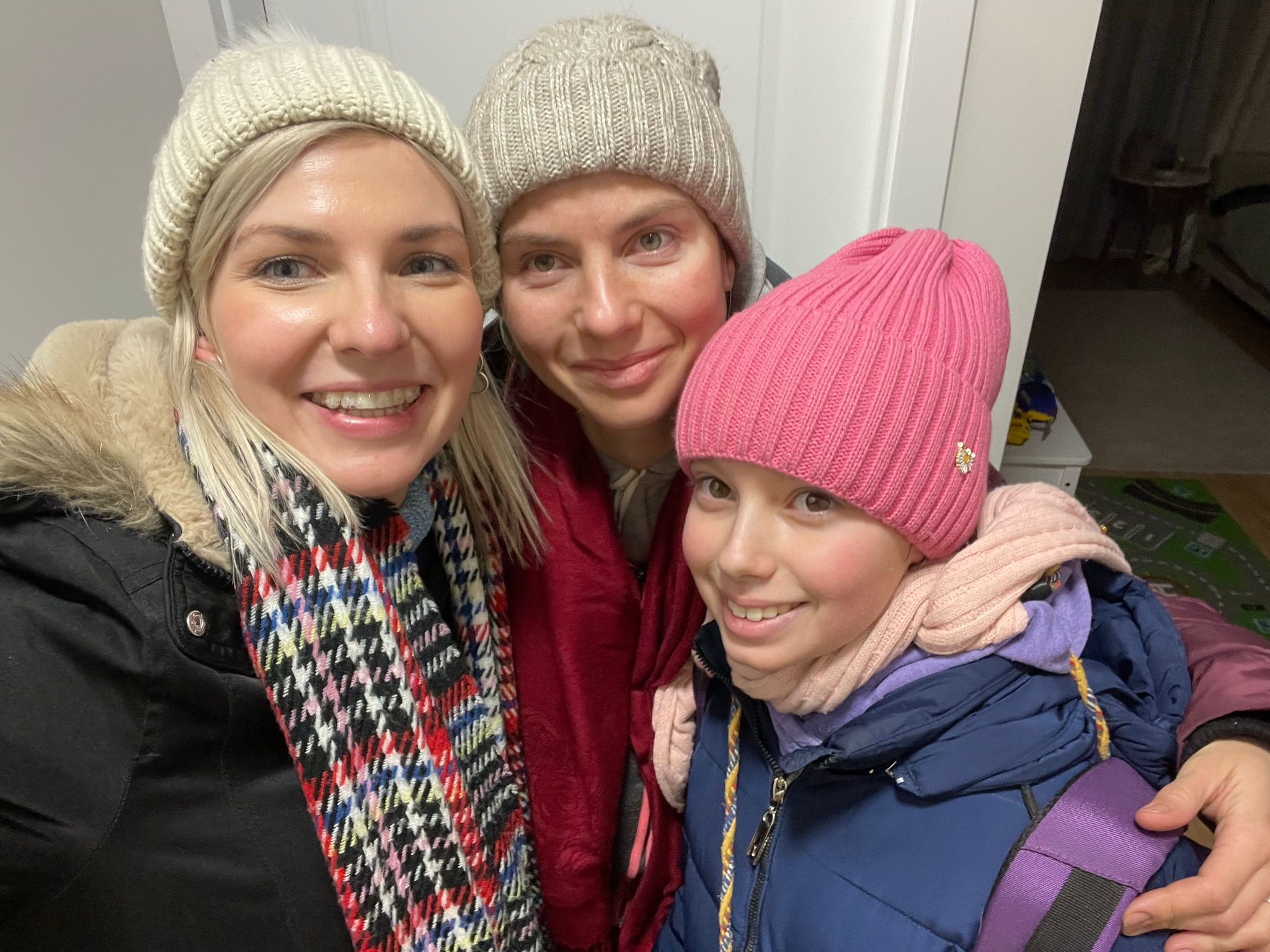 Alice Mishchenko (left) with her sister Oksana (centre) and Oksana’s daughter Sofiia after the trio were reunited on Monday (Alice Mishchenko/PA)