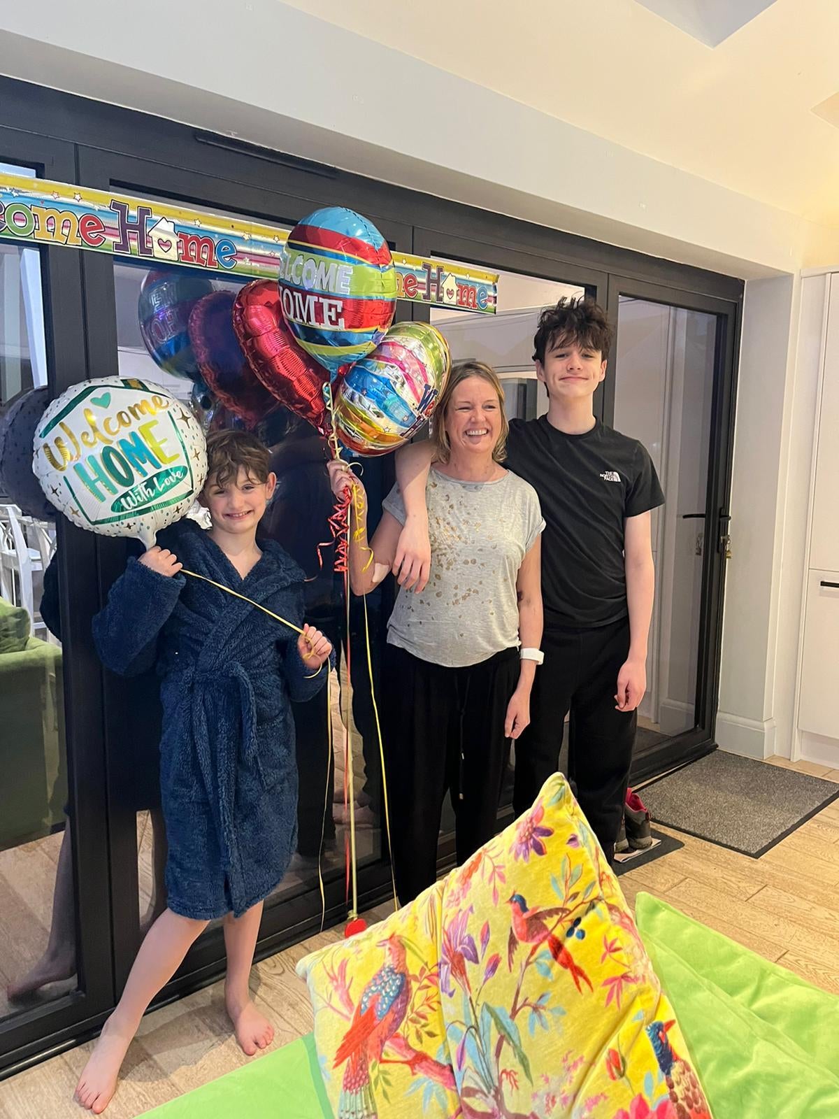 Nicola Sharpe with her sons after spending 190 days in hospital (Royal Papworth Hospital/PA)