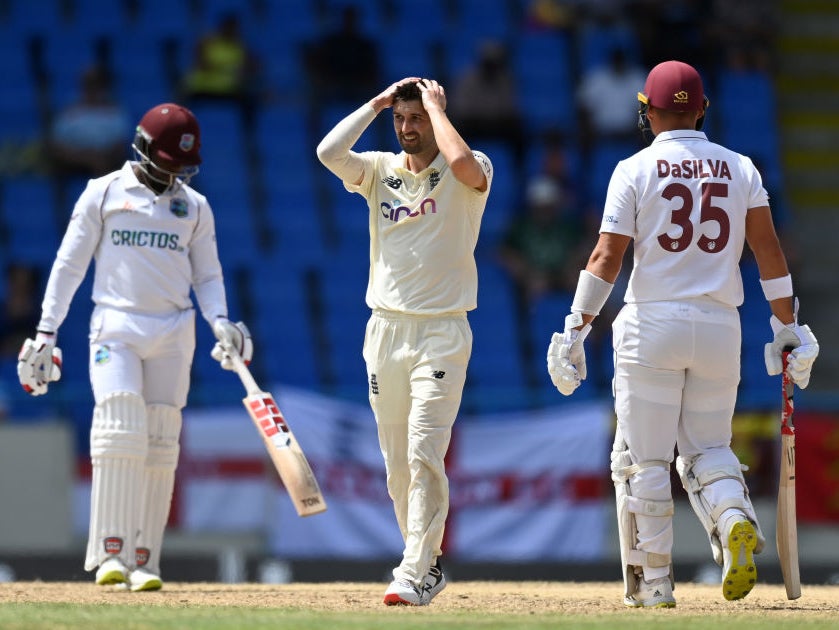 Mark Wood struggled with an elbow injury on day three