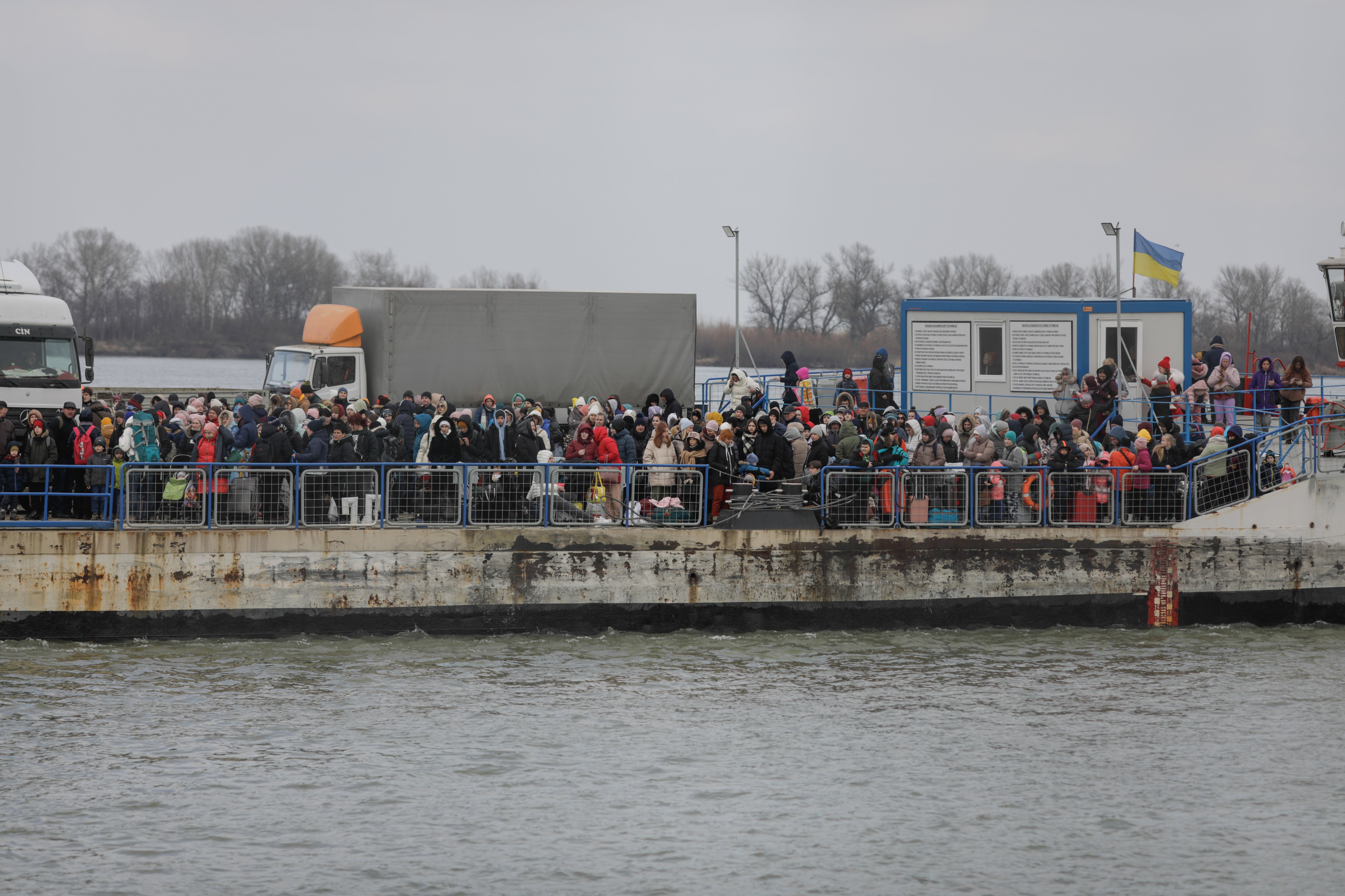 Ukrainian refugees cross the Danube to Isaccea, Romania