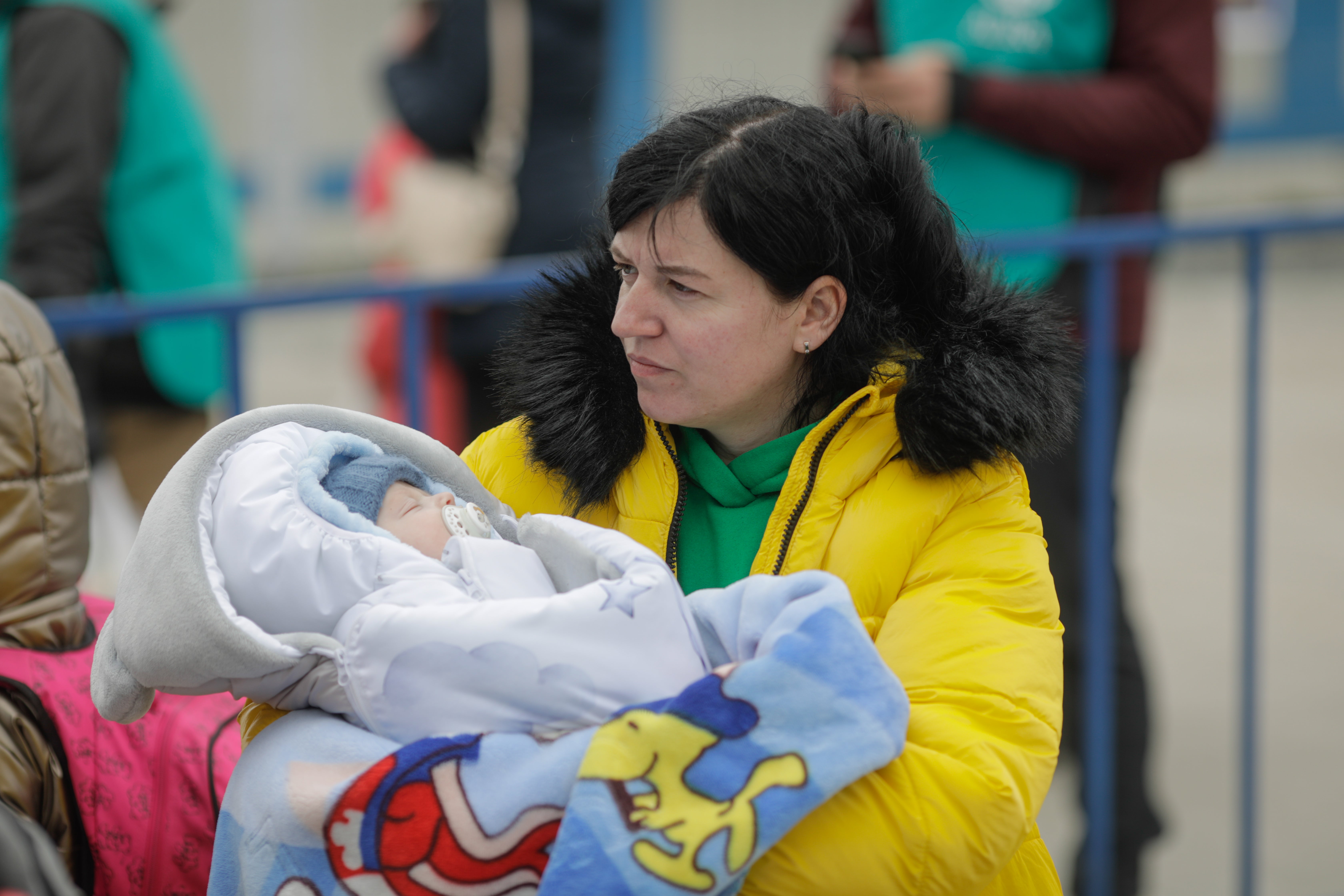 Diana and her two-month-old son, Daniiel, reach Romania having fled their home in Ukraine