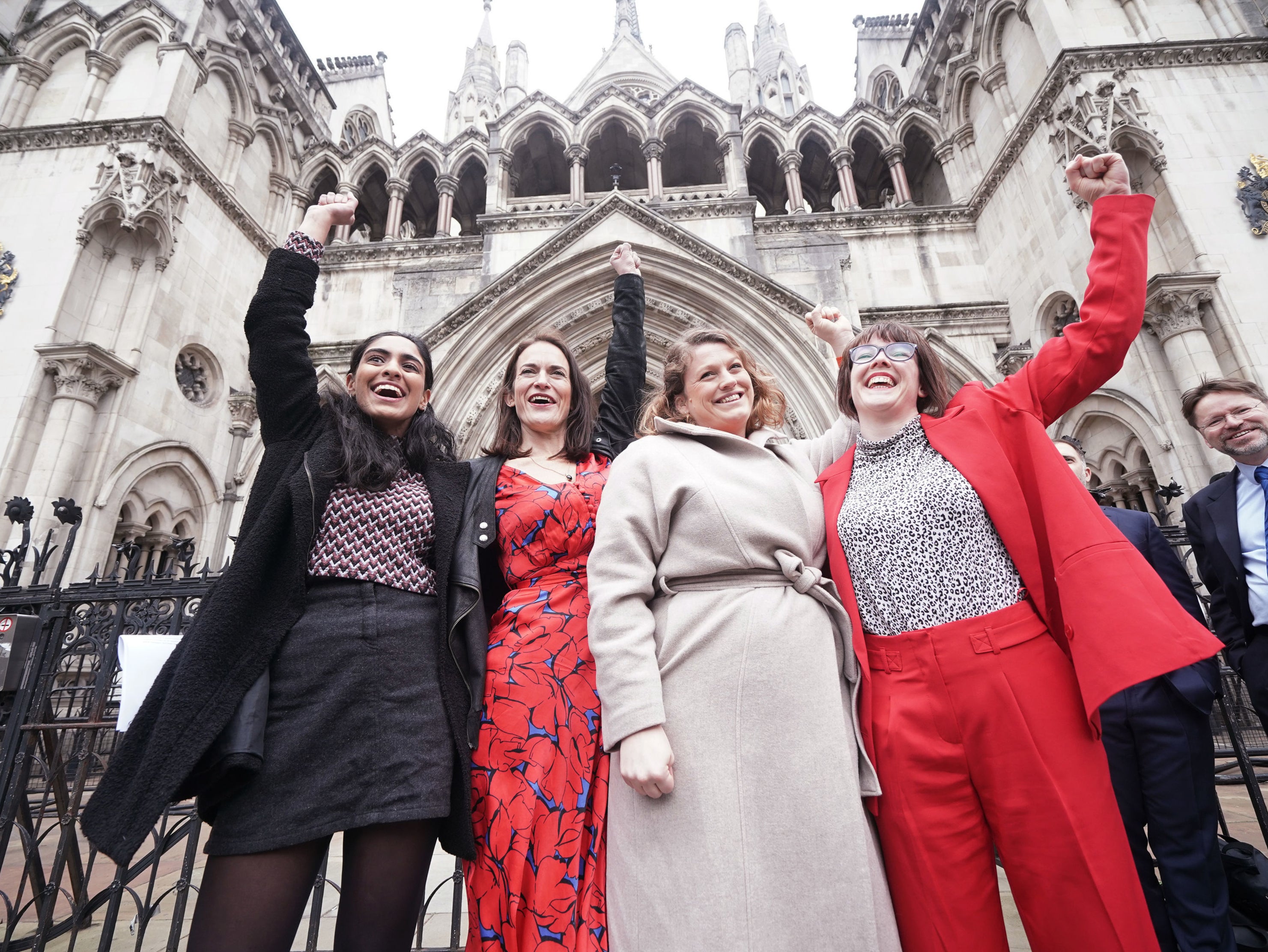 Reclaim These Streets founders (from left) Henna Shah, Jamie Klingler, Anna Birley and Jessica Leigh celebrate outside the Royal Courts of Justice, London, after winning their legal challenge against the Metropolitan Police in March